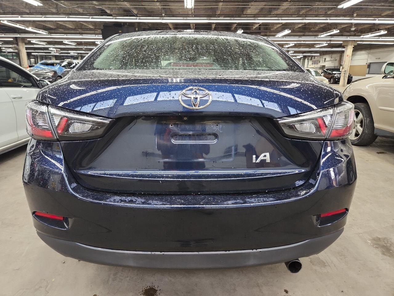 2018 Toyota Yaris Ia Base Синий vin: 3MYDLBYV3JY316392 Damage: Deck Lid, Heavy Scratch, 1/8 To 1/2 Inch