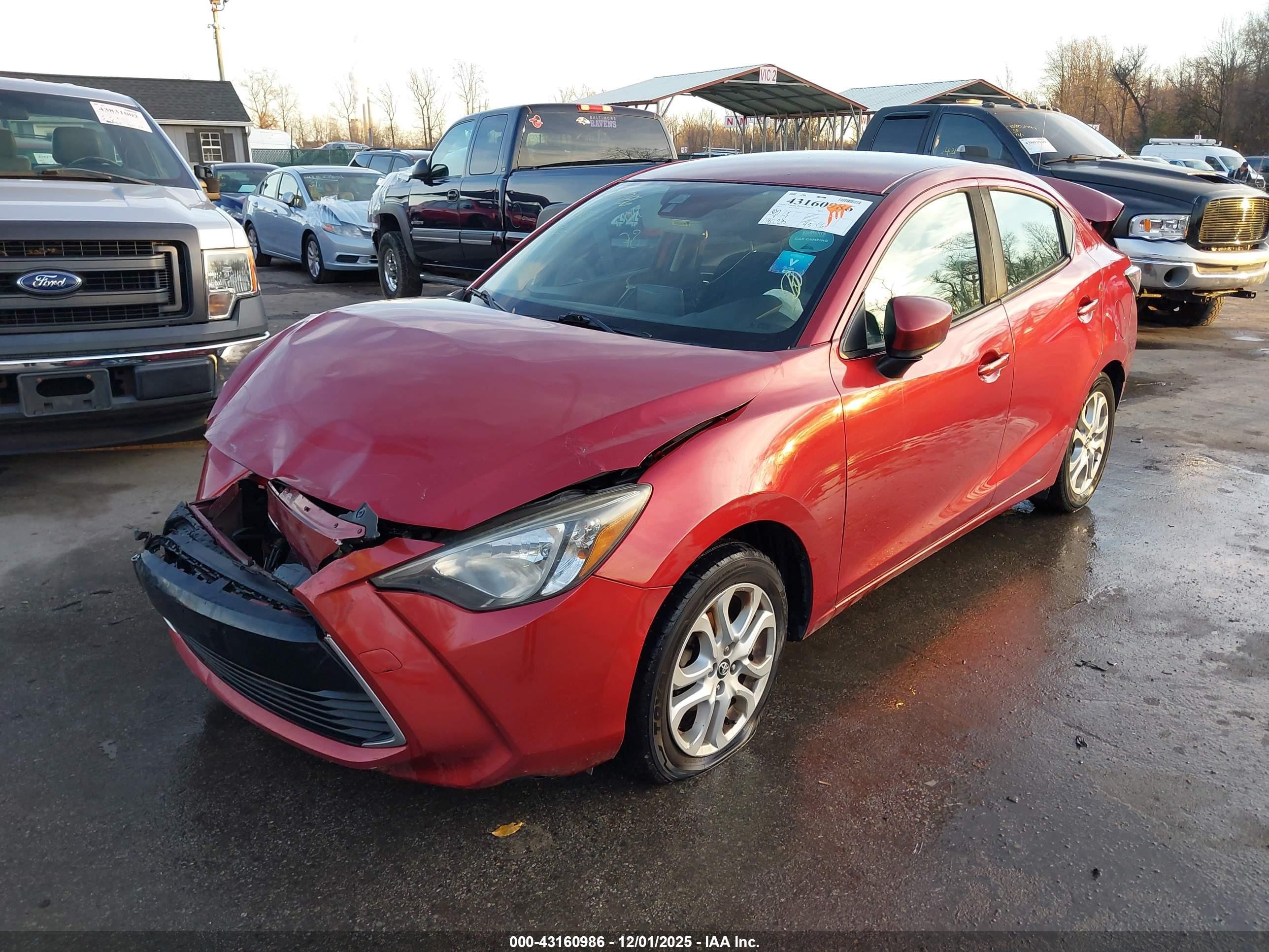 2017 Toyota Yaris Ia   Red vin: 3MYDLBYV7HY165146