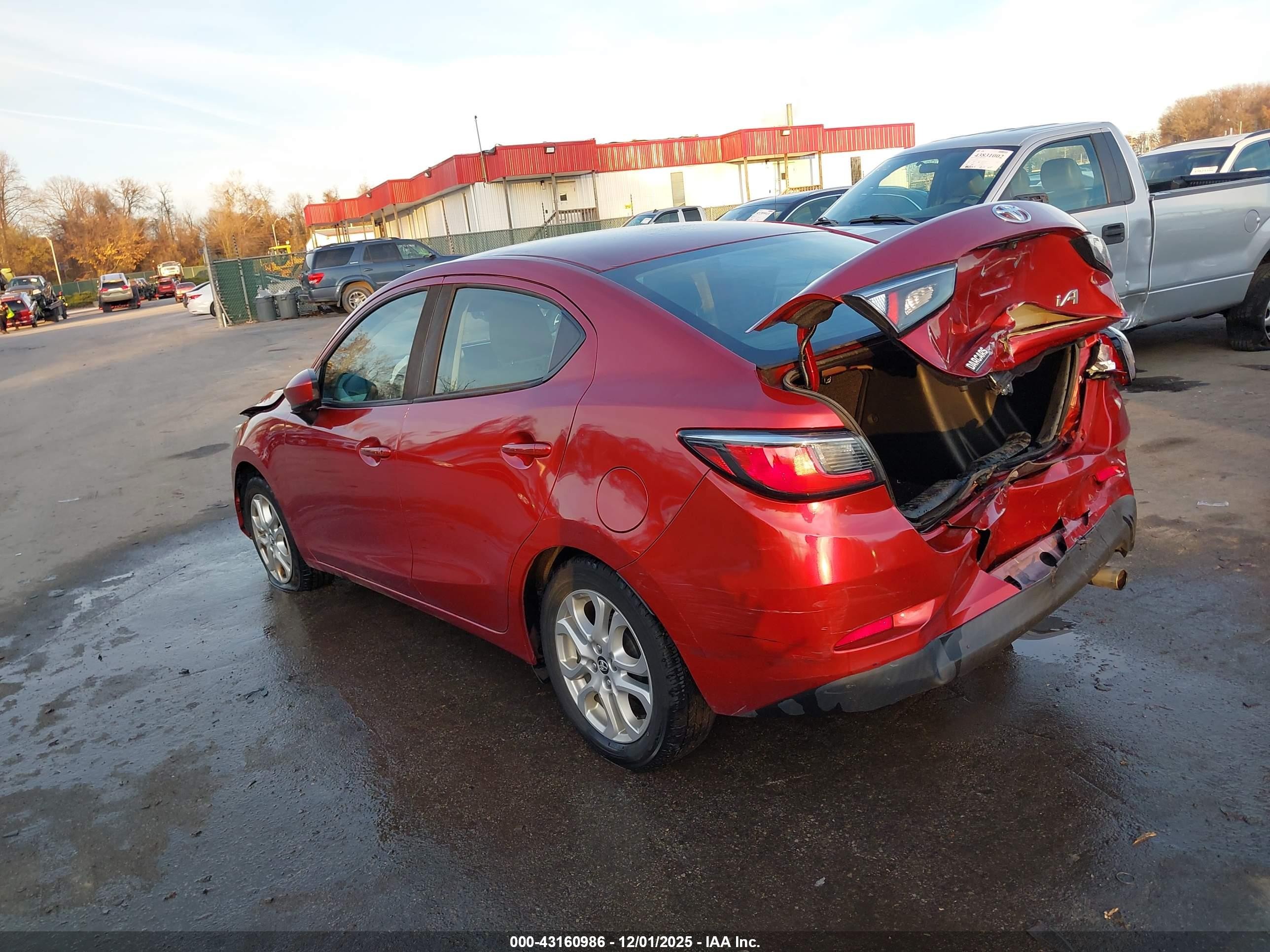 2017 Toyota Yaris Ia   Red vin: 3MYDLBYV7HY165146