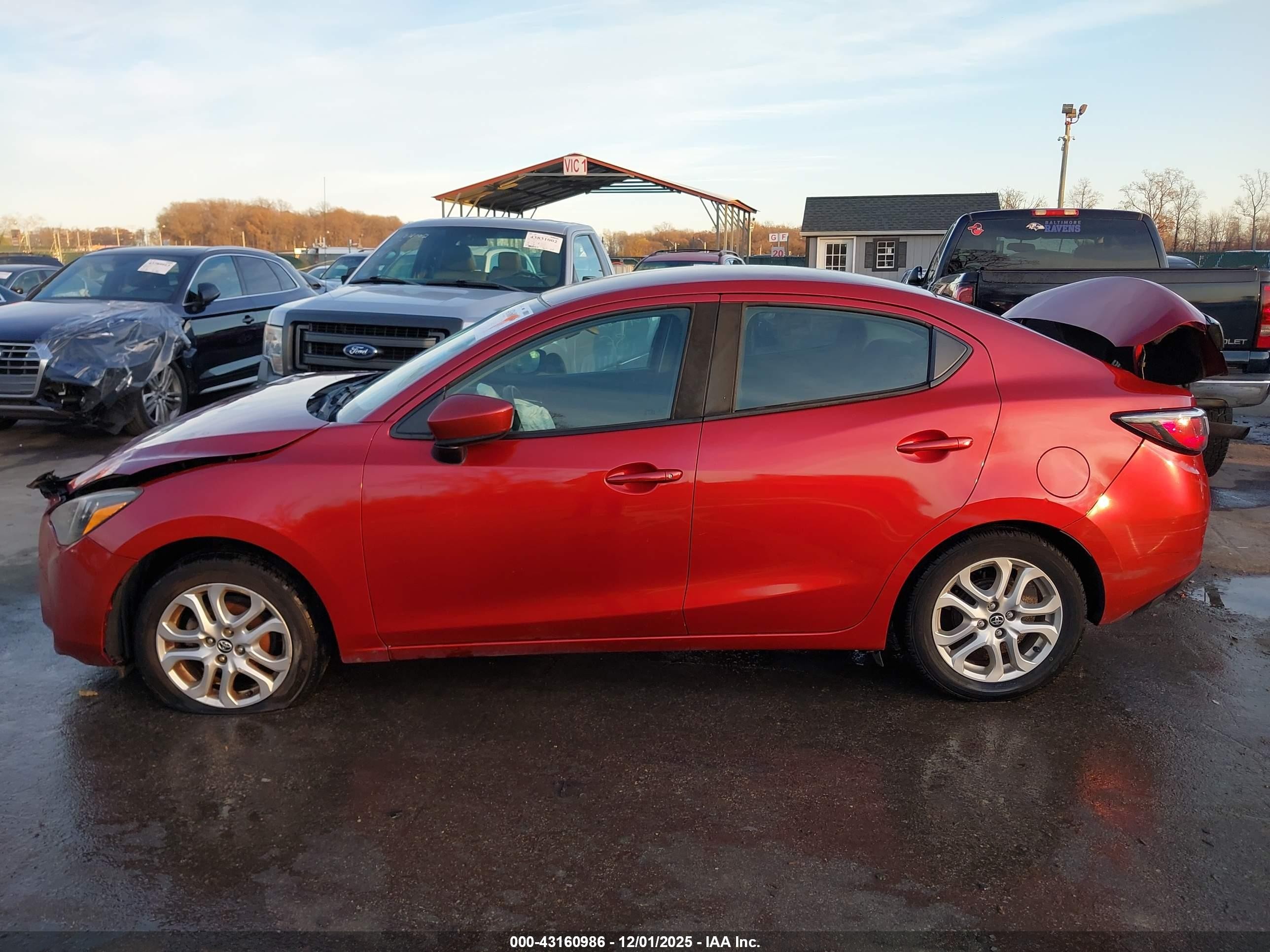 2017 Toyota Yaris Ia   Red vin: 3MYDLBYV7HY165146