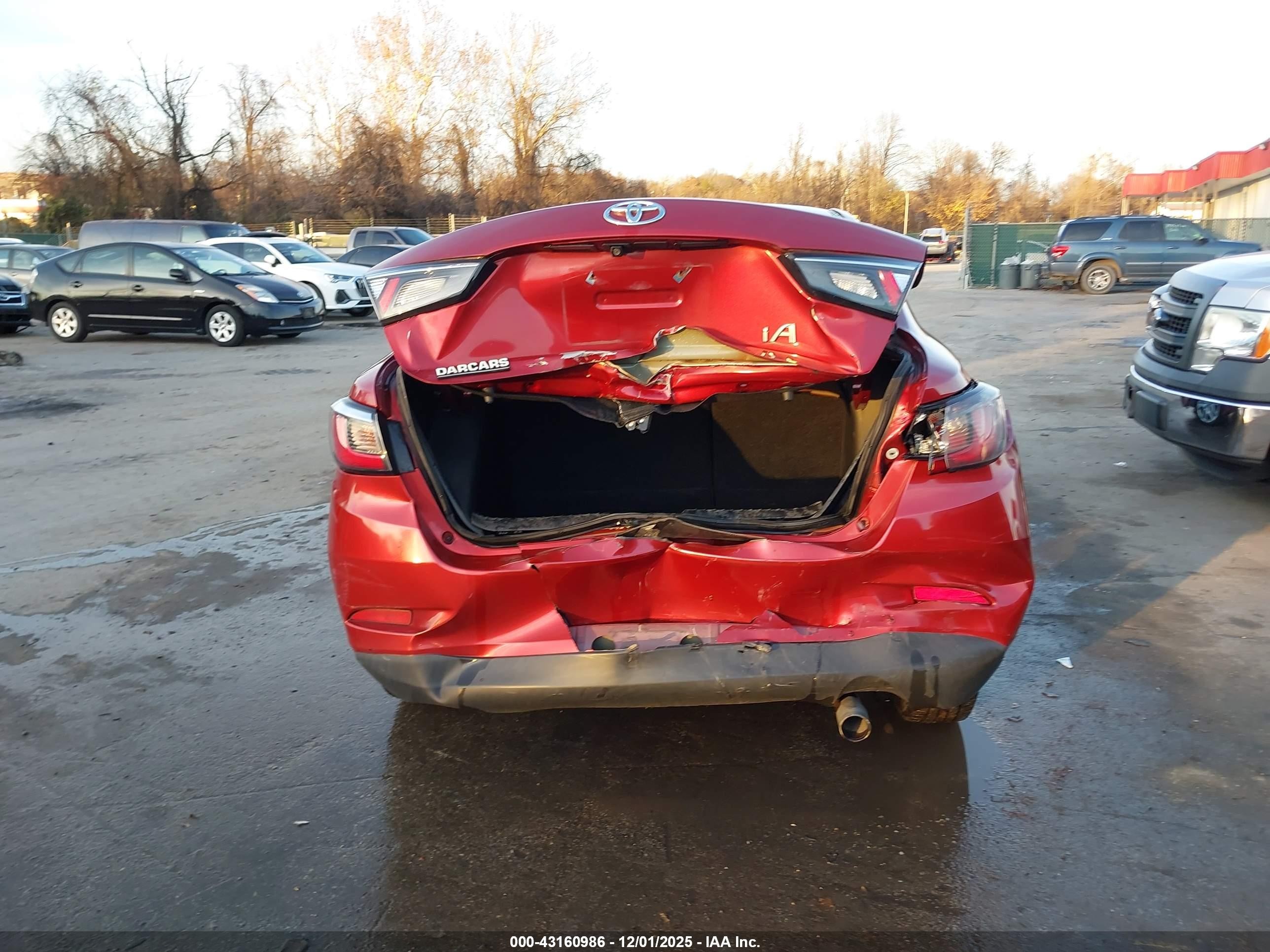 2017 Toyota Yaris Ia   Red vin: 3MYDLBYV7HY165146