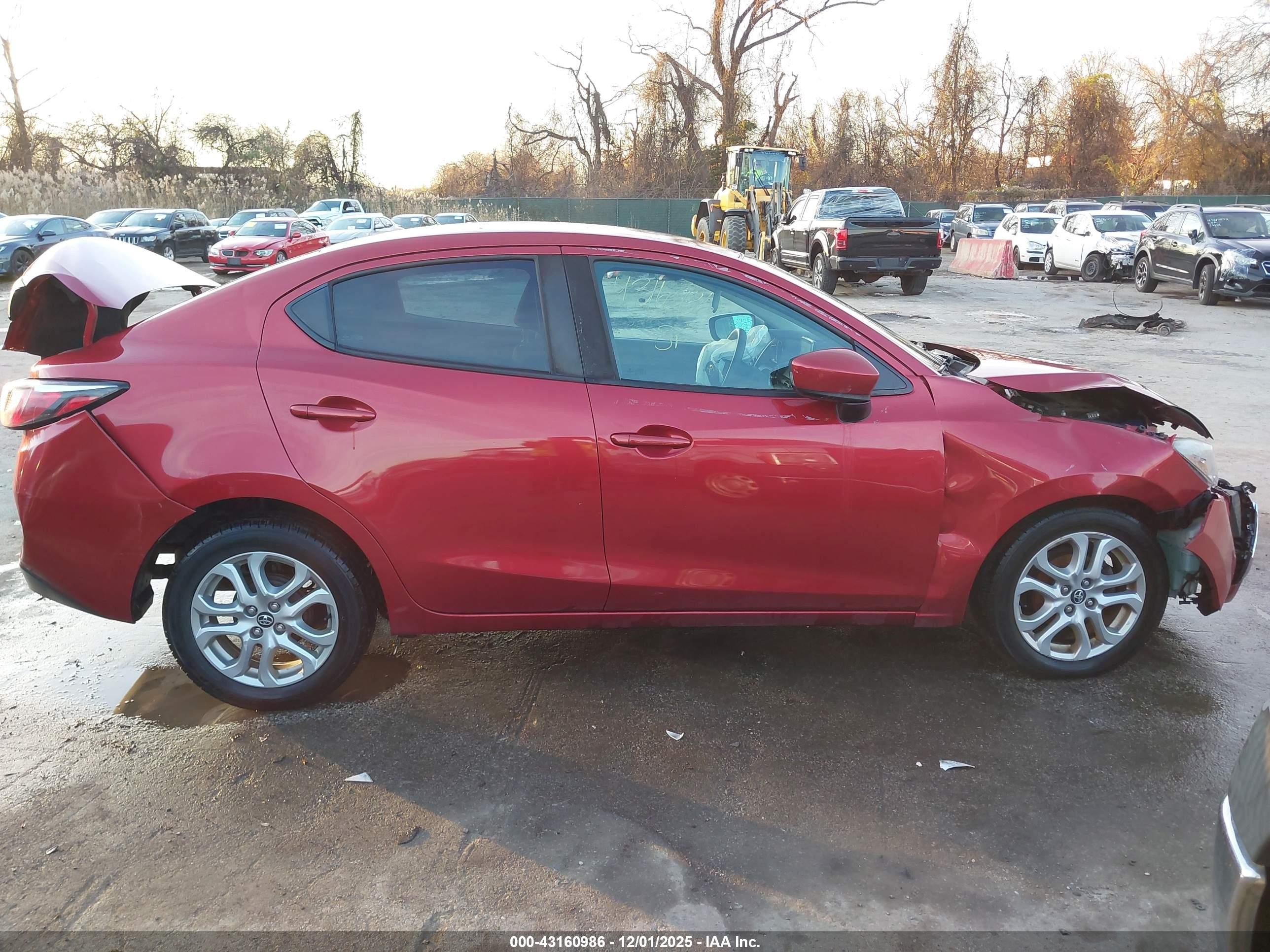 2017 Toyota Yaris Ia   Red vin: 3MYDLBYV7HY165146
