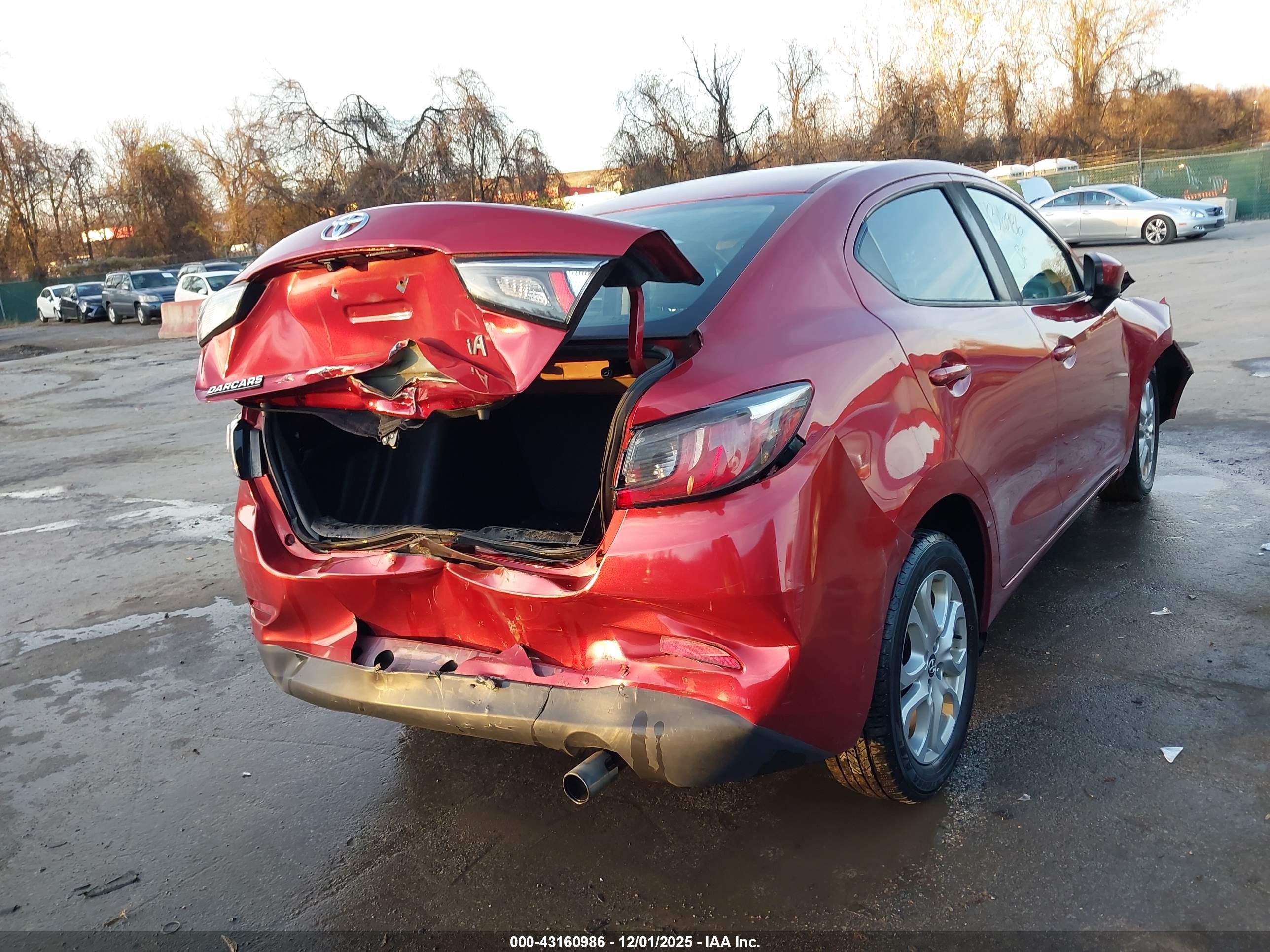 2017 Toyota Yaris Ia   Red vin: 3MYDLBYV7HY165146