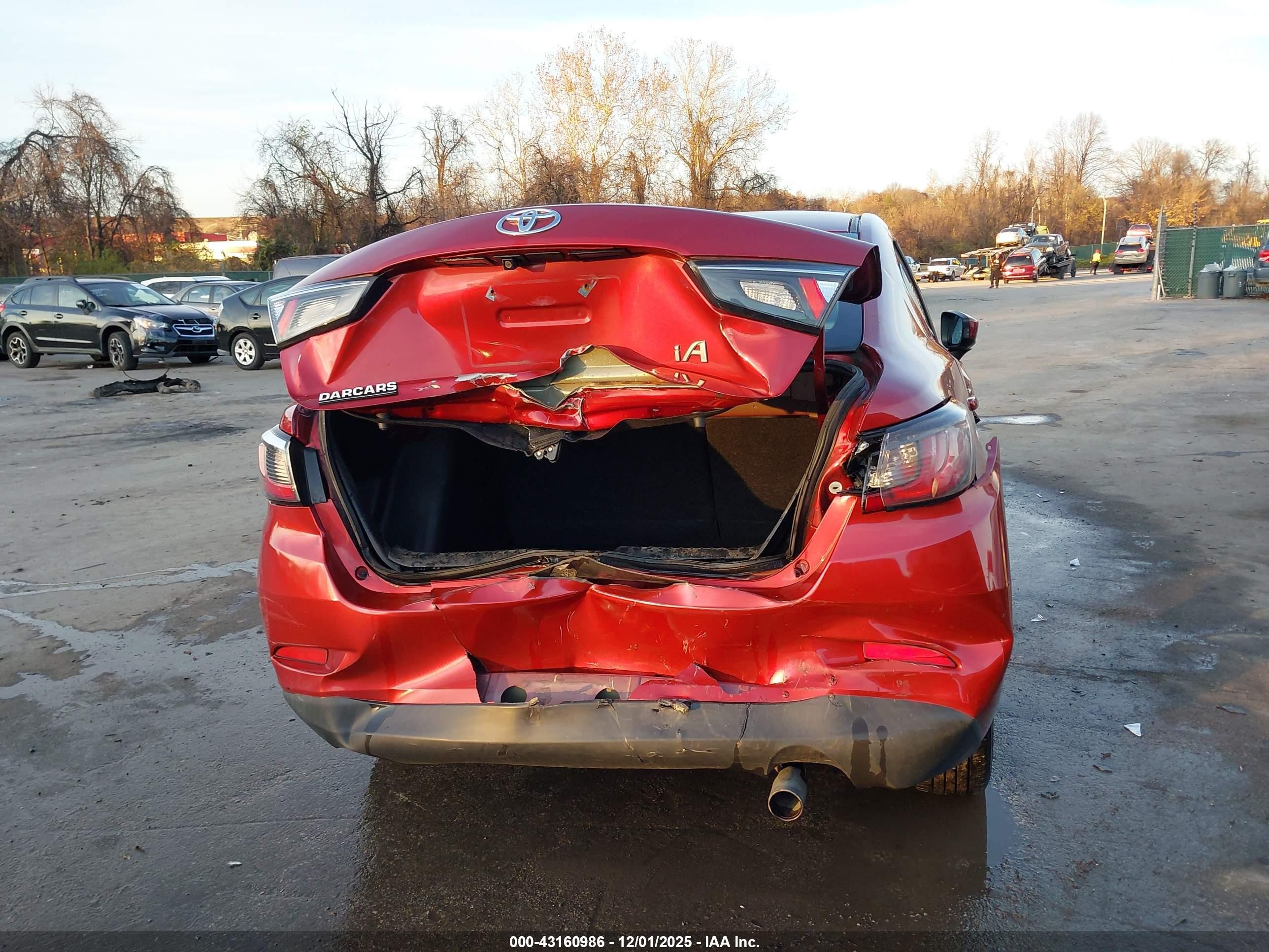 2017 Toyota Yaris Ia   Red vin: 3MYDLBYV7HY165146
