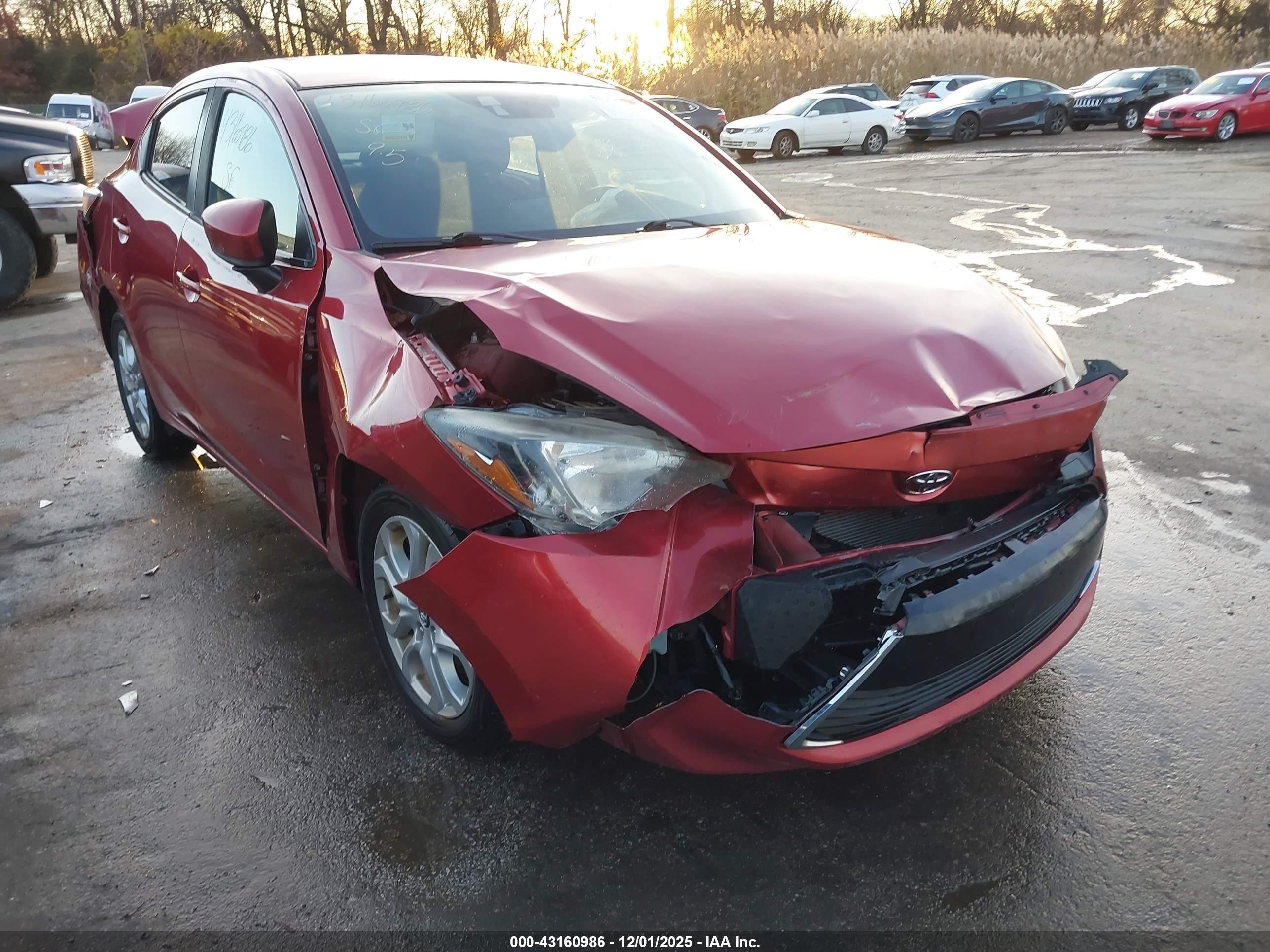 2017 Toyota Yaris Ia   Red vin: 3MYDLBYV7HY165146