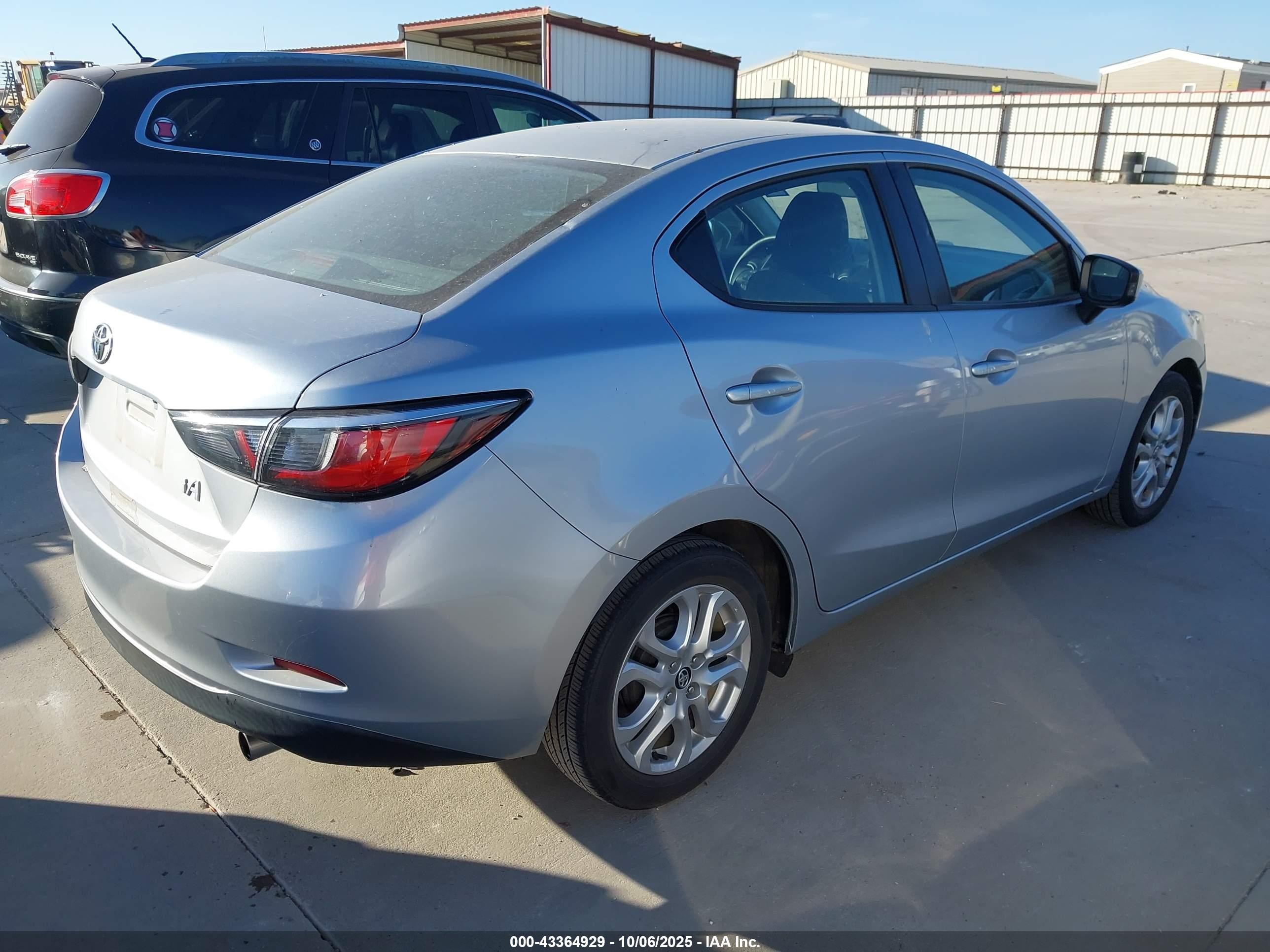 2018 Toyota Yaris Ia   Silver vin: 3MYDLBYV9JY306384