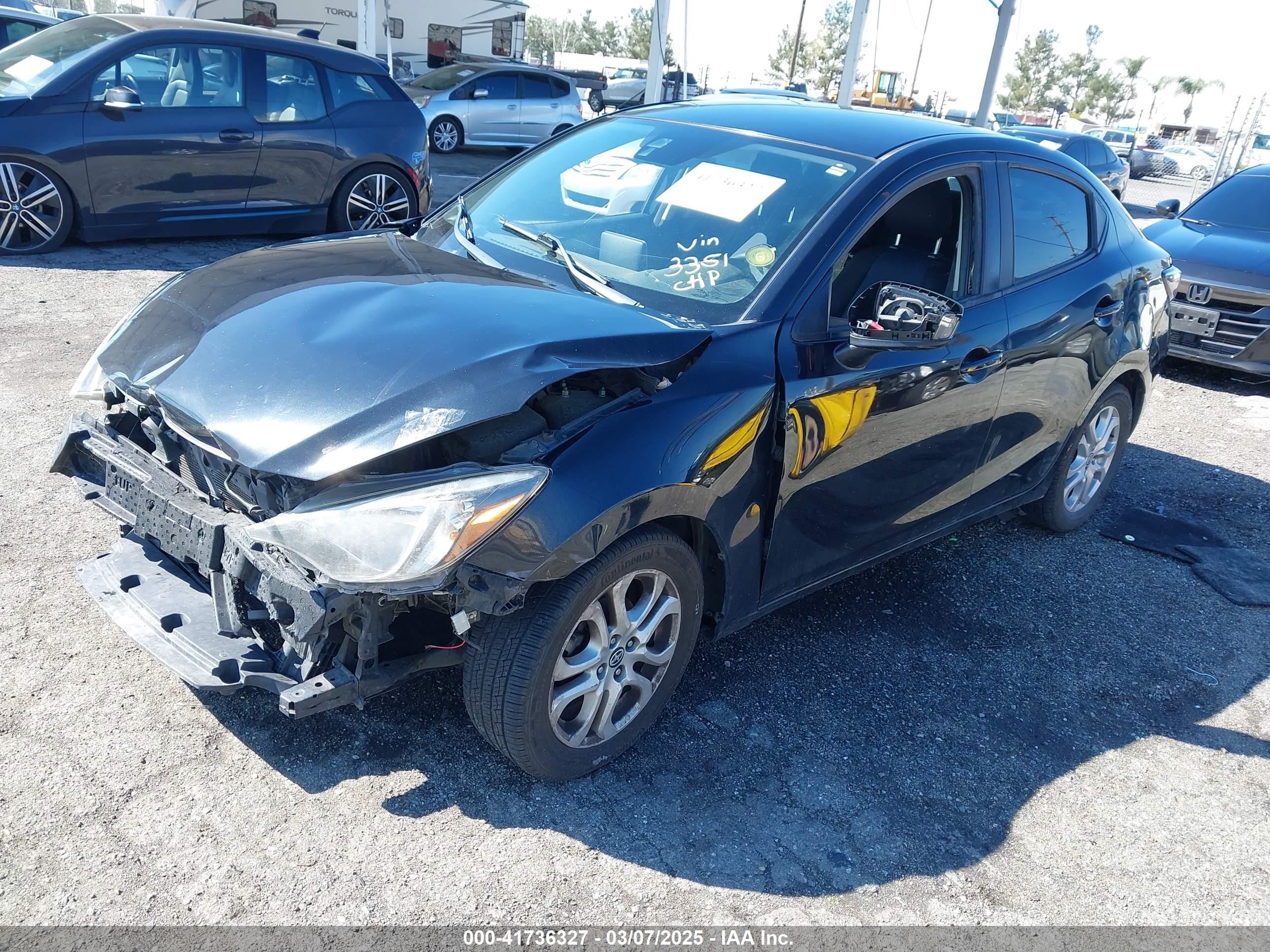 2016 Scion Ia   Black vin: 3MYDLBZV0GY123351