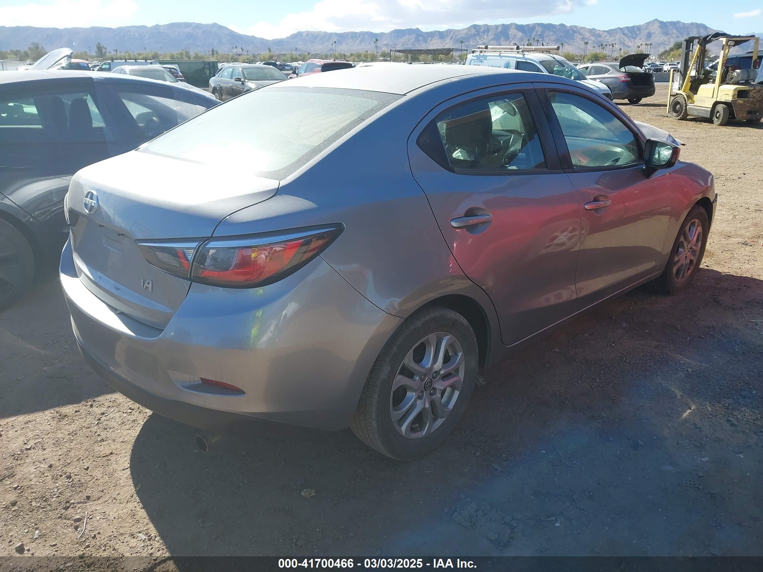 2016 Scion Ia   Gray vin: 3MYDLBZV3GY141777