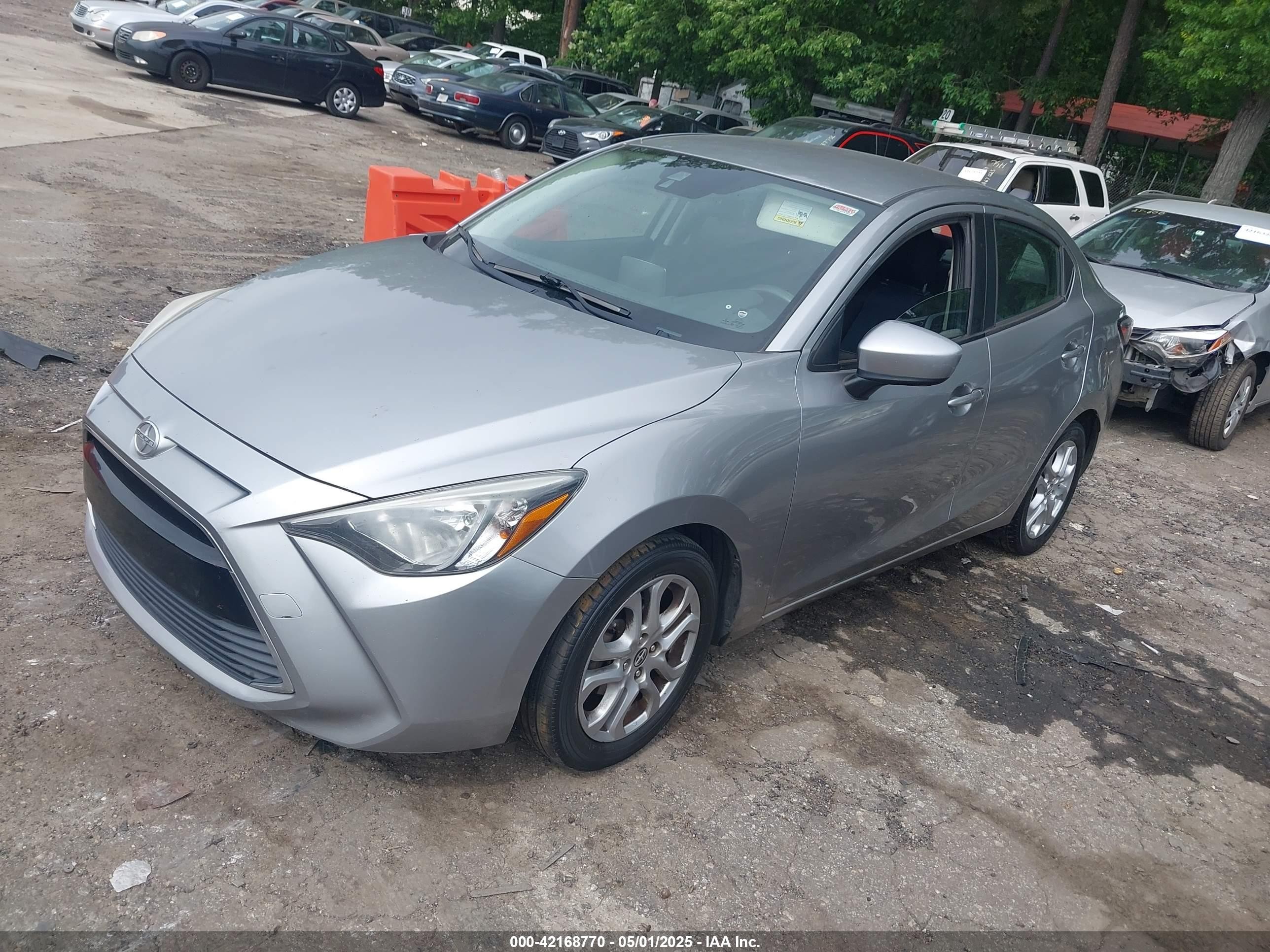 2016 Toyota Scion Ia   Silver vin: 3MYDLBZV7GY123315