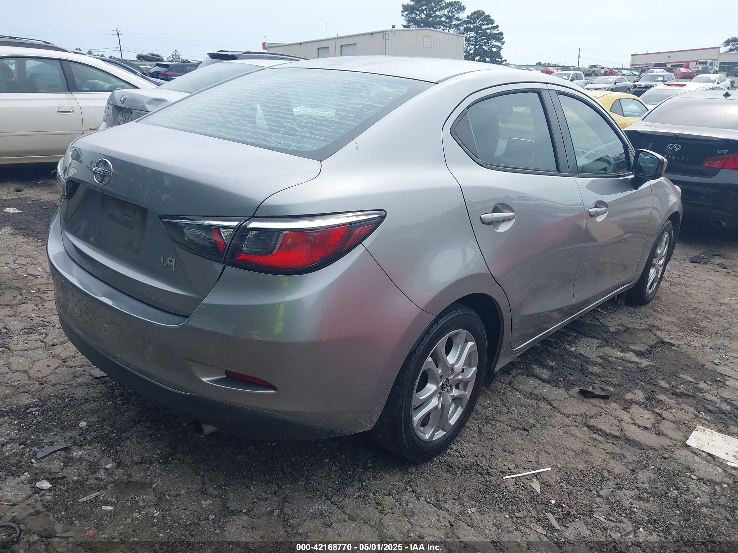 2016 Toyota Scion Ia   Silver vin: 3MYDLBZV7GY123315