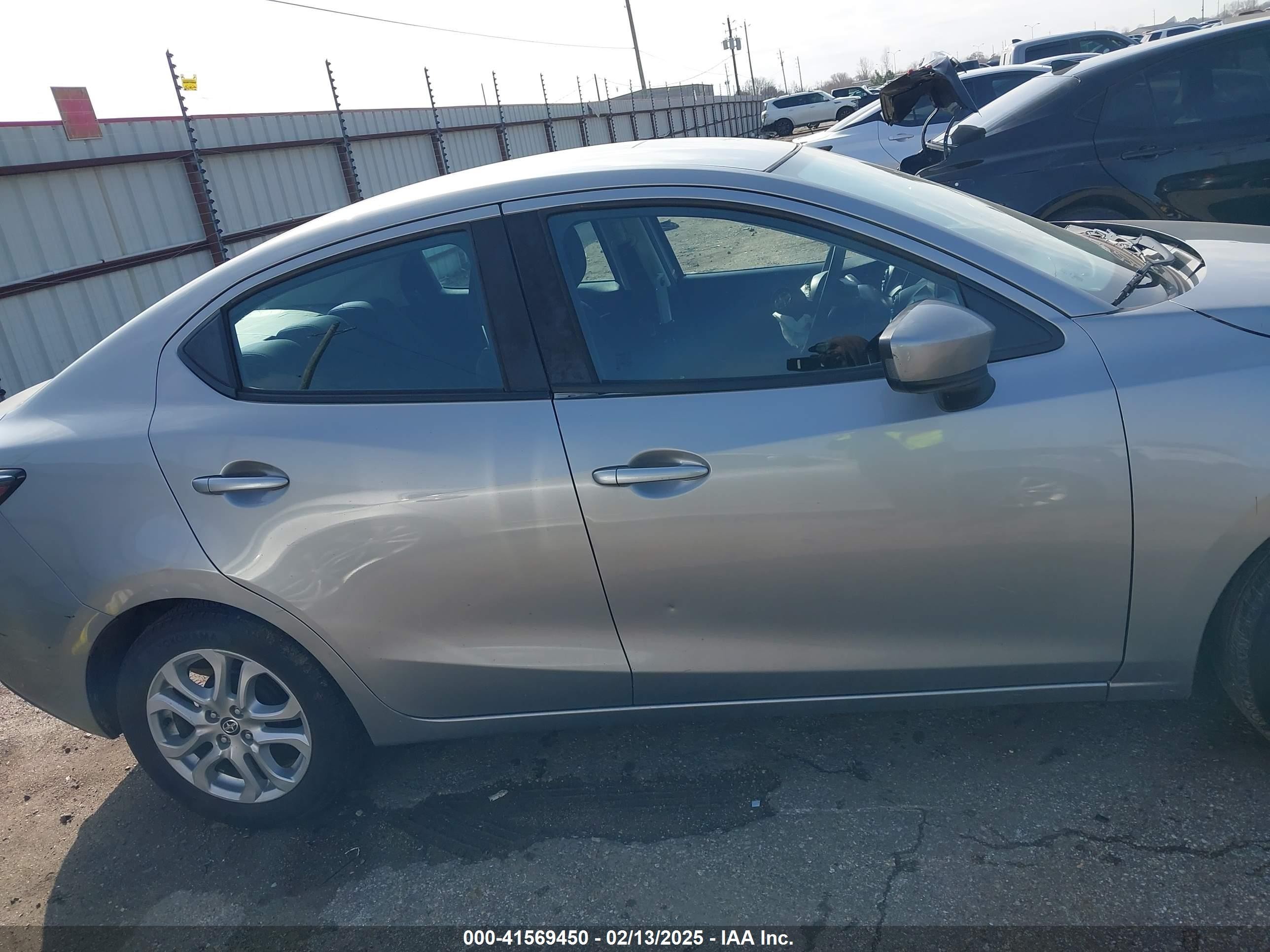 2016 Scion Ia   Gray vin: 3MYDLBZV7GY143564