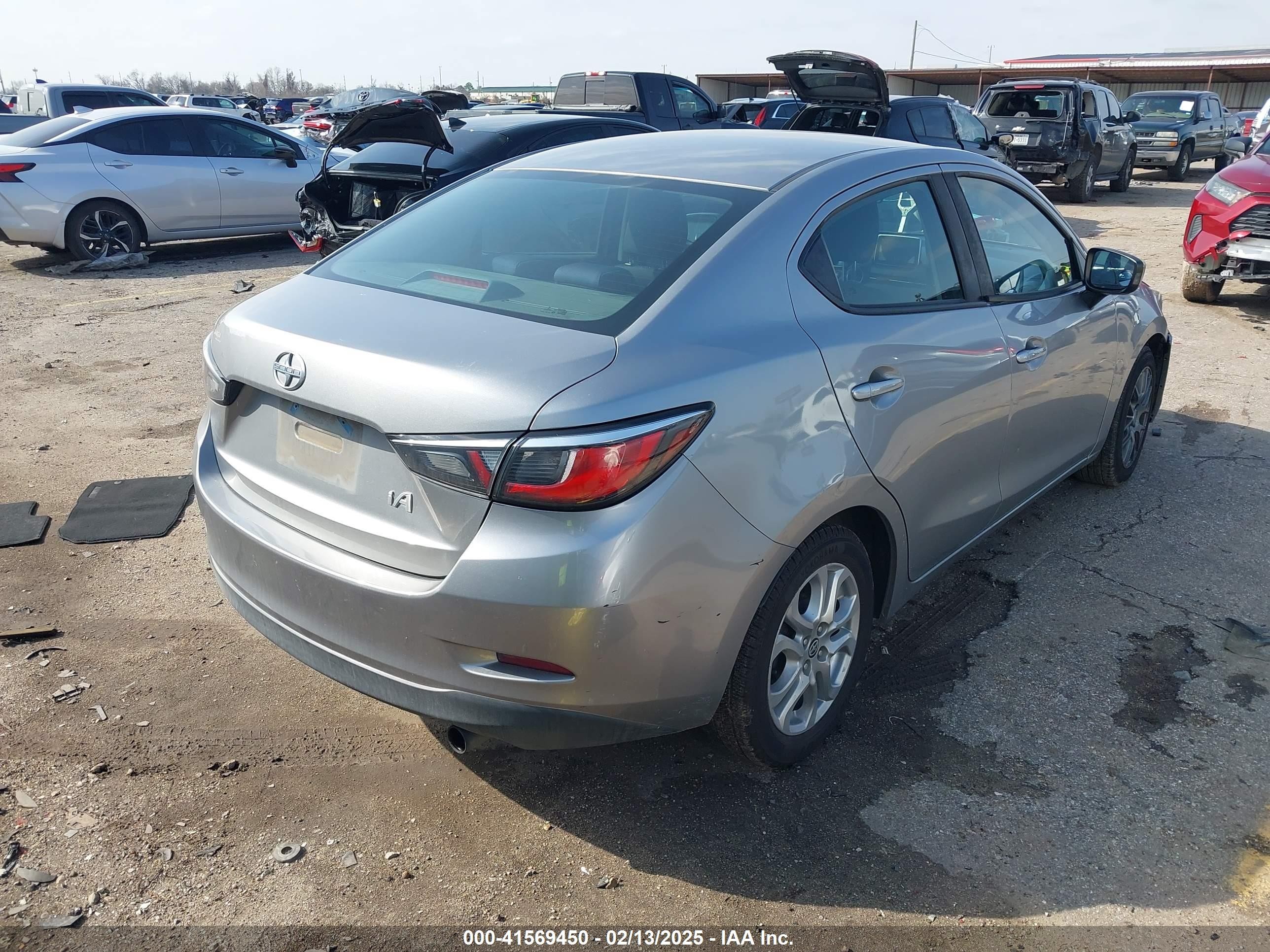 2016 Scion Ia   Gray vin: 3MYDLBZV7GY143564