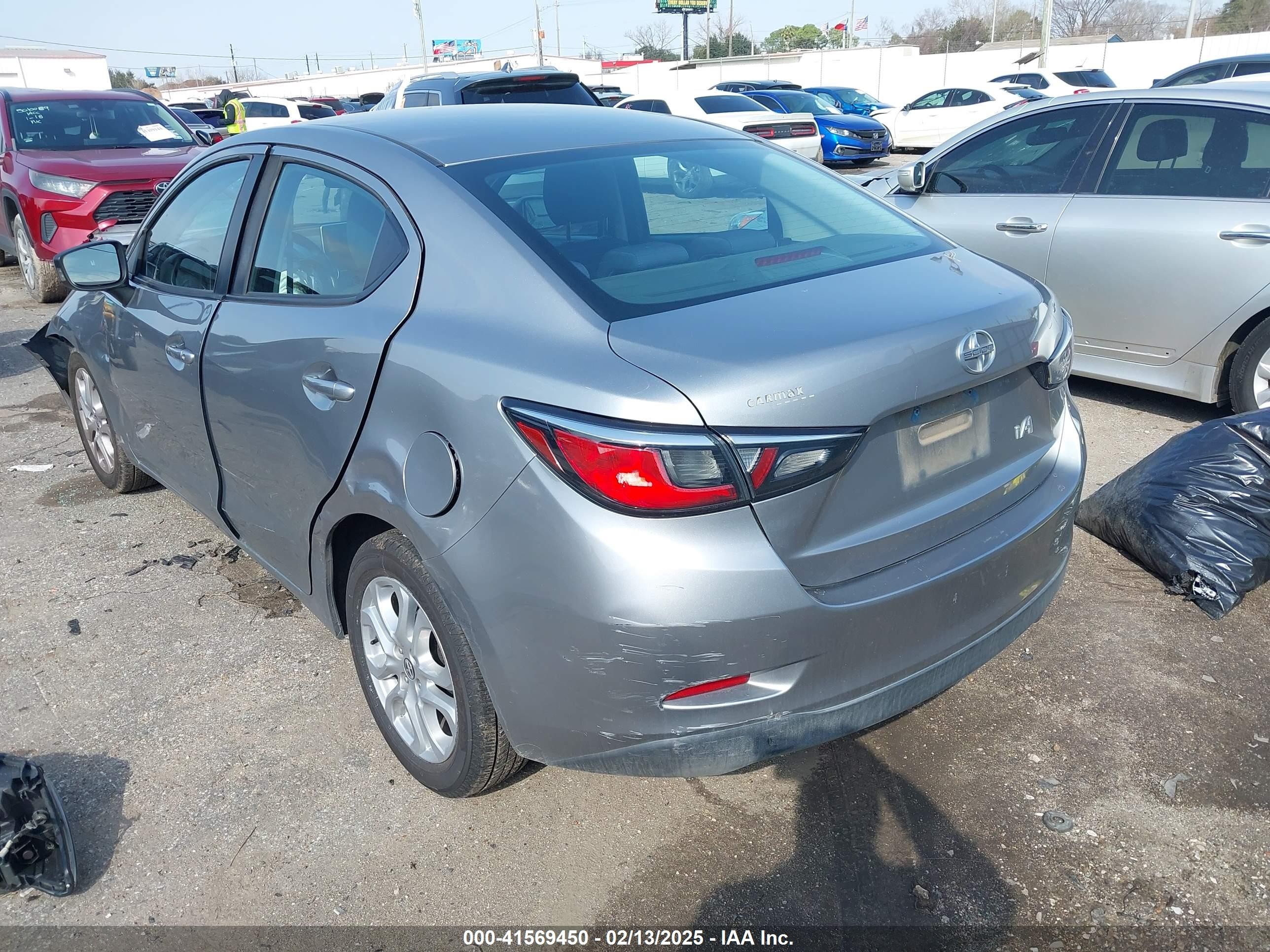 2016 Scion Ia   Gray vin: 3MYDLBZV7GY143564