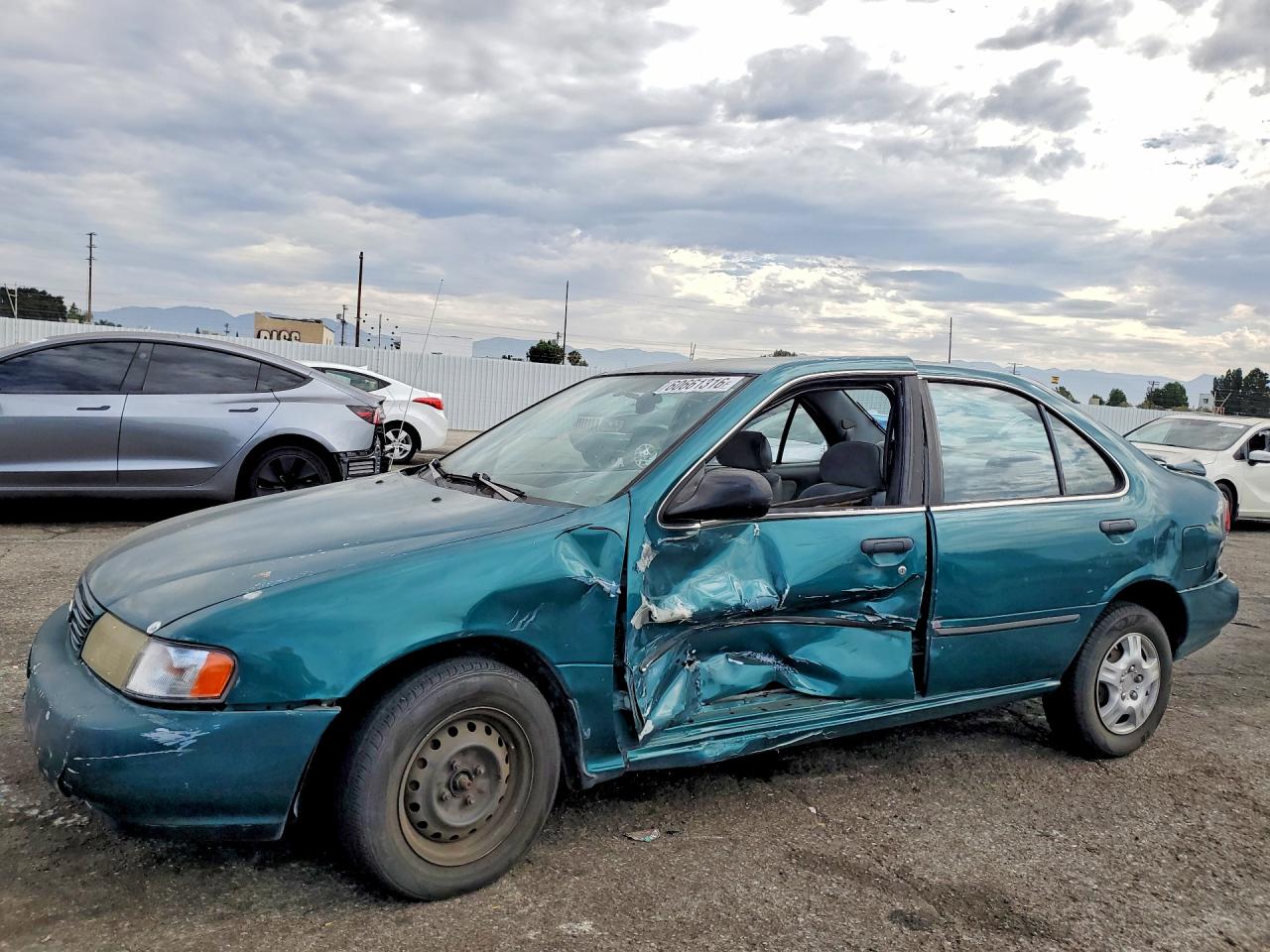 1996 Nissan Sentra Base Teal vin: 3N1AB41D8TL023219