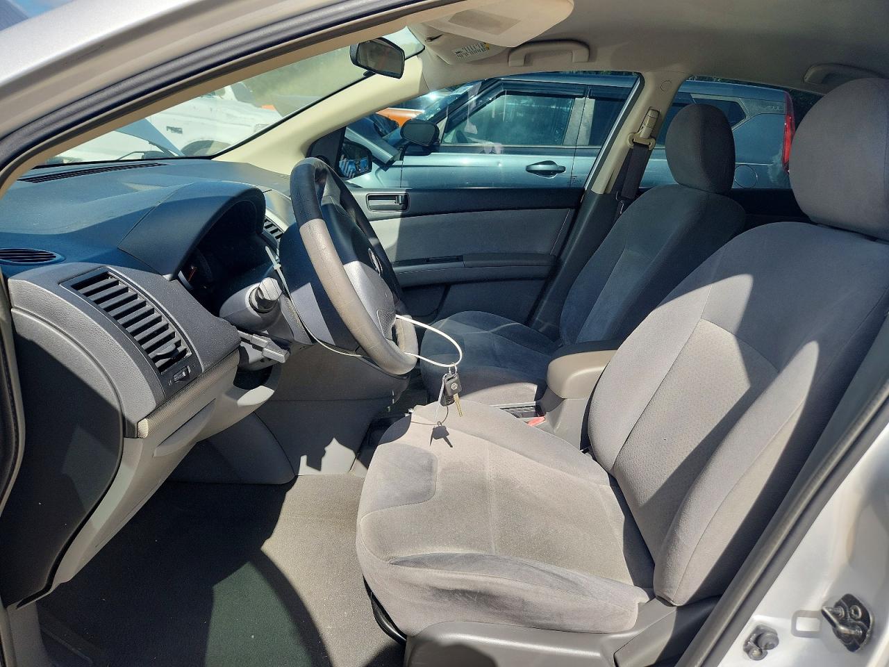 2009 Nissan Sentra 2.0 Серебряный vin: 3N1AB61E29L613865