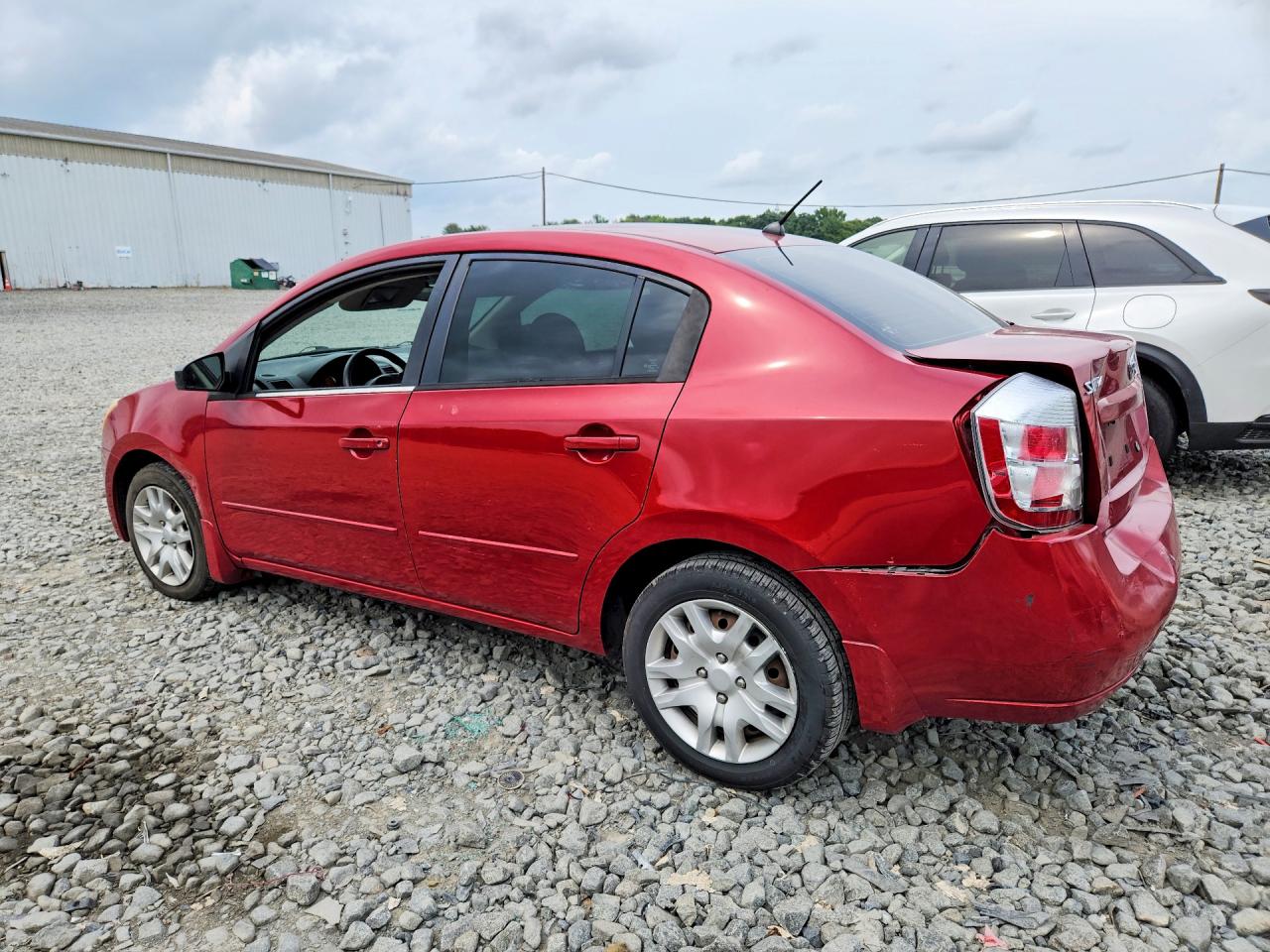 2009 Nissan Sentra 2.0 Red vin: 3N1AB61E59L614556