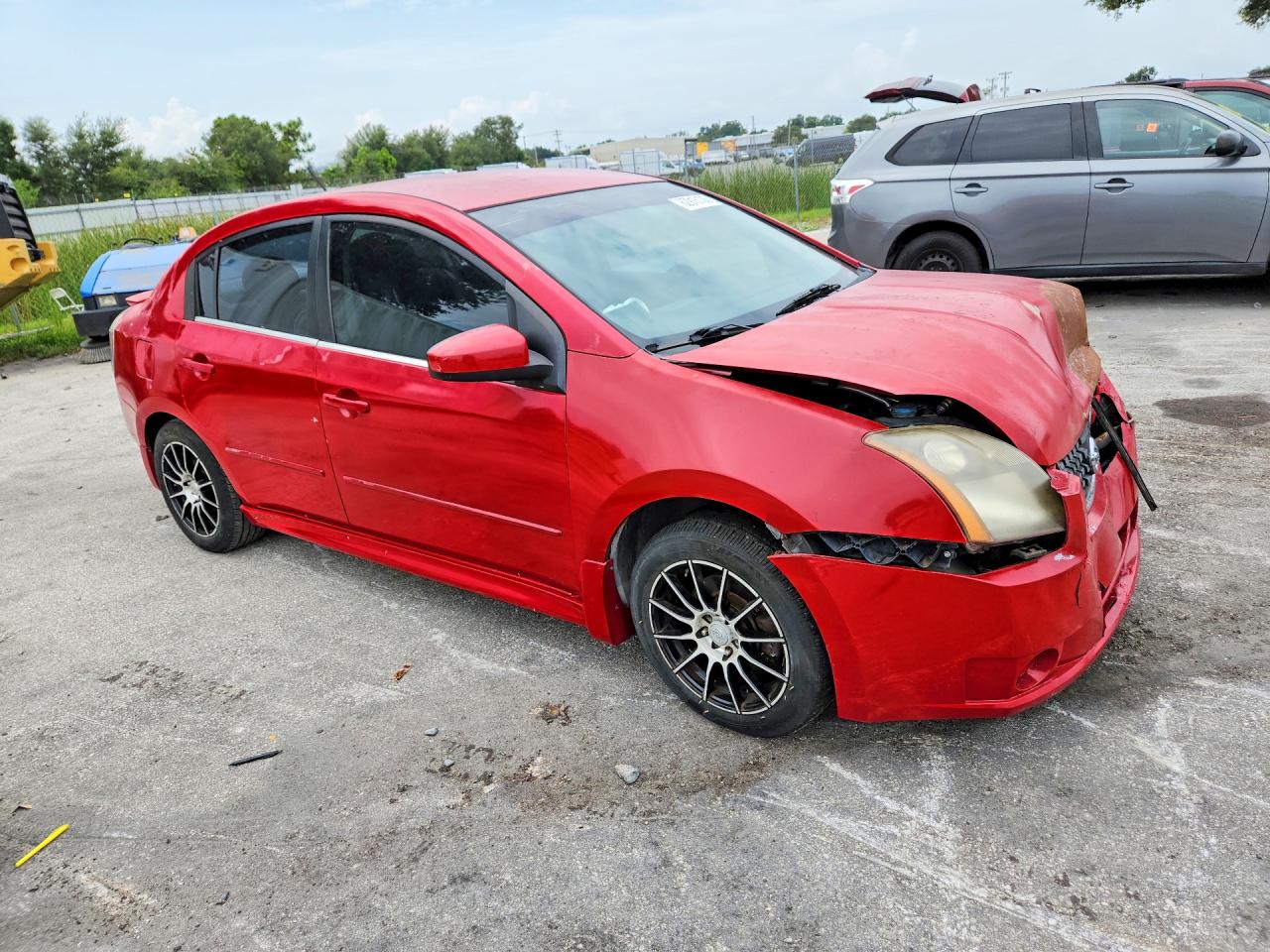 2009 Nissan Sentra 2.0 Red vin: 3N1AB61E59L675292