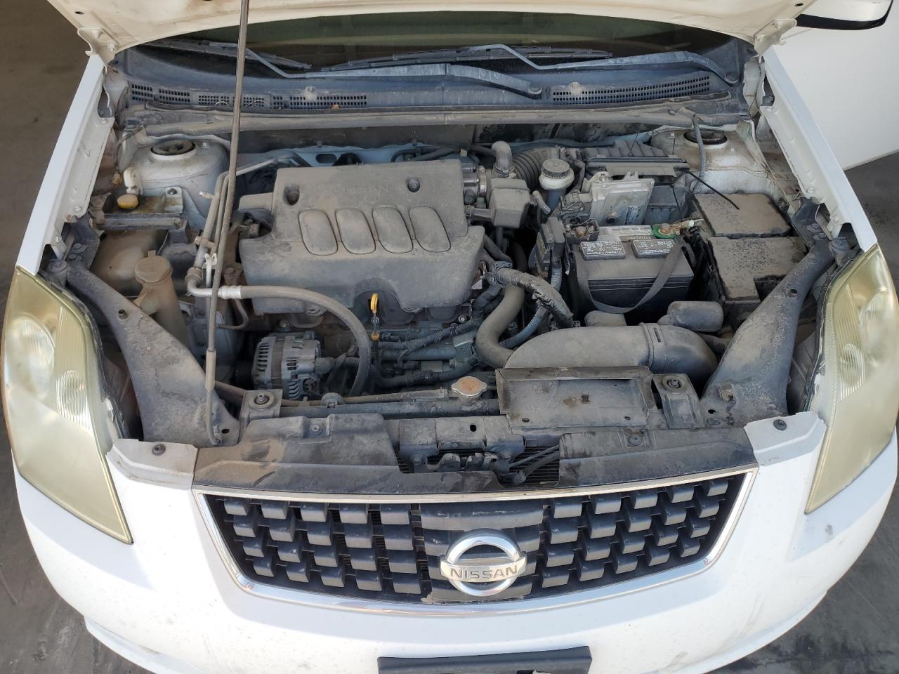 2009 Nissan Sentra 2.0 White vin: 3N1AB61E99L647236 Damage: Left Head Lamp, Faded, Repair Required