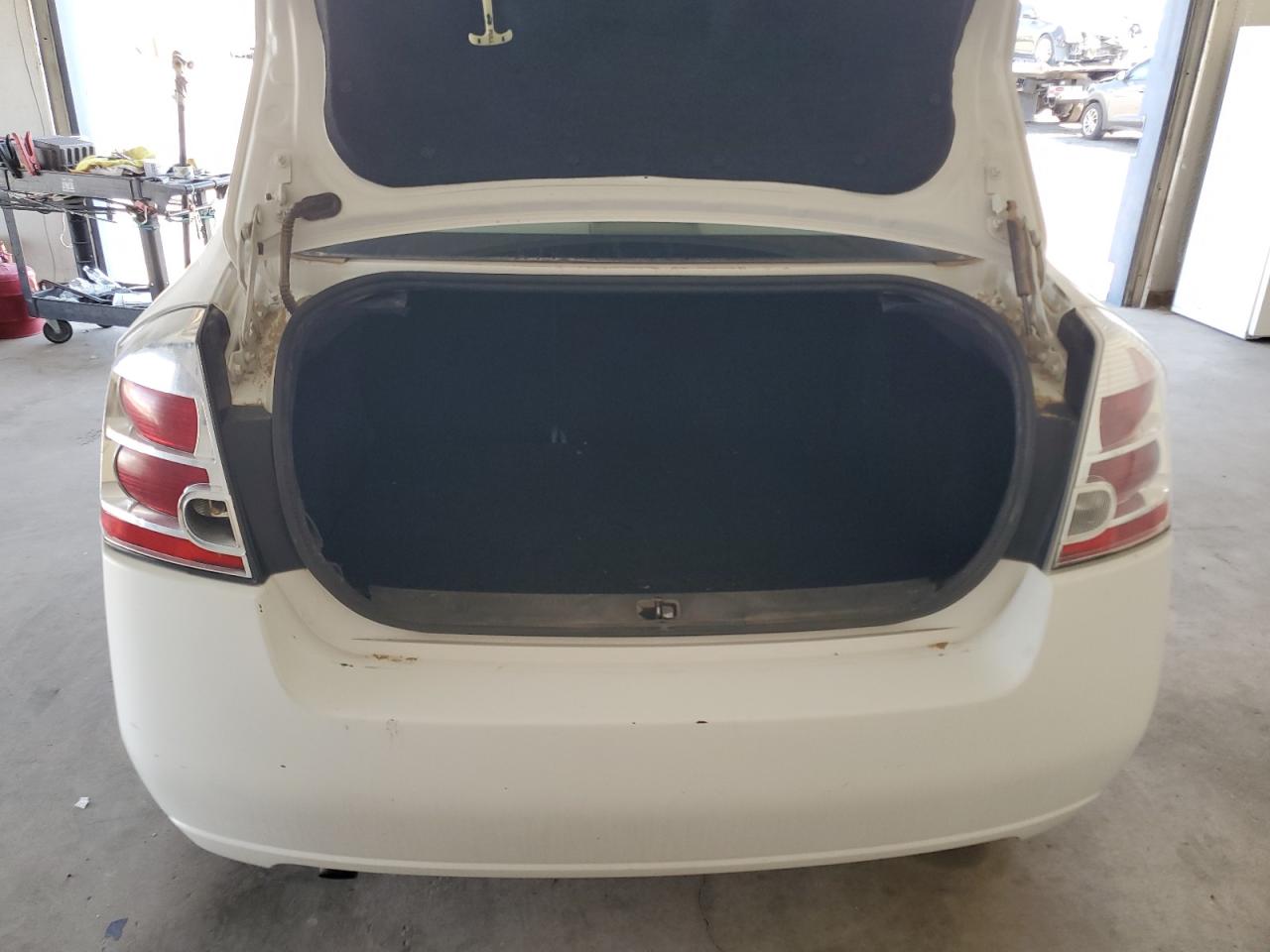 2009 Nissan Sentra 2.0 White vin: 3N1AB61E99L647236 Damage: Rear Bumper, Multiple Scratches Heavy, 3