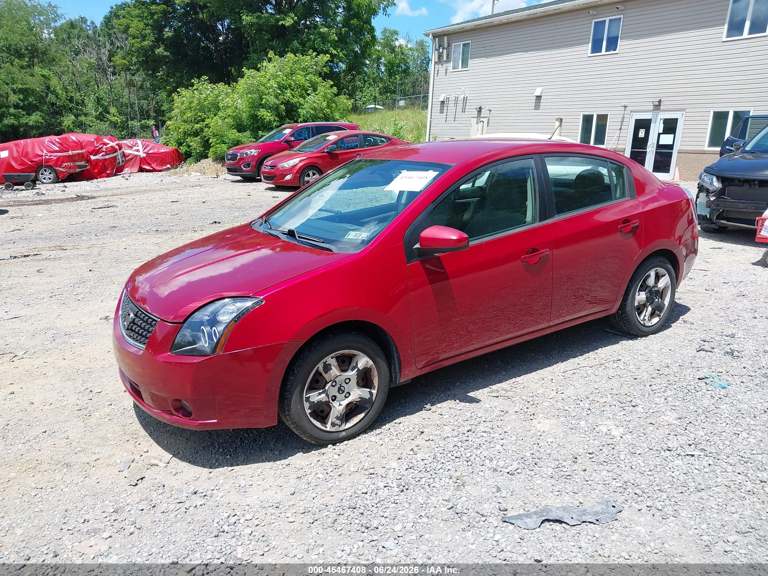 2009 Nissan Sentra 2.0s Red vin: 3N1AB61EX9L623415