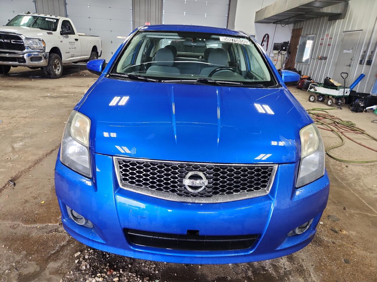 2011 Nissan Sentra 2.0 Blue vin: 3N1AB6AP2BL672129 Damage: Hood, Peeling, 2 To 3 Inches
