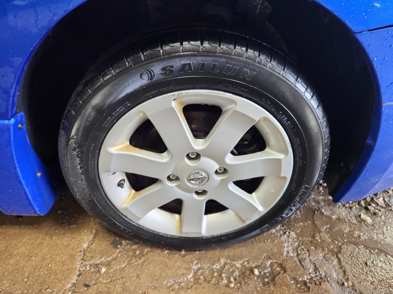 2011 Nissan Sentra 2.0 Blue vin: 3N1AB6AP2BL672129 Damage: Right Front Wheel, Curb Rash, > 12 Inches