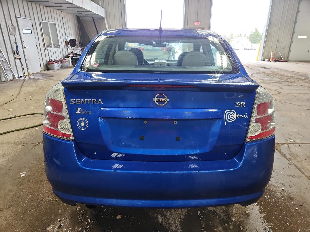 2011 Nissan Sentra 2.0 Blue vin: 3N1AB6AP2BL672129 Damage: Rear Bumper, Heavy Scratch, > 12 Inches