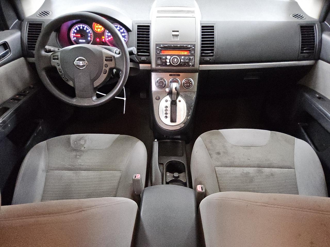2012 Nissan Sentra 2.0 Черный vin: 3N1AB6AP5CL677326 Damage: Left Front Seat Cushion, Burn Hole, 1/8 To 1/2 Inch