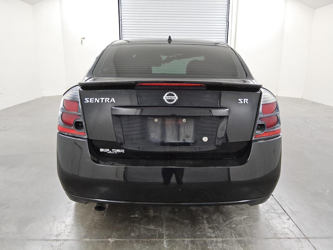 2012 Nissan Sentra 2.0 Черный vin: 3N1AB6AP5CL677326 Damage: Rear Bumper/Cover, Scraped, 1 To 2 Inches