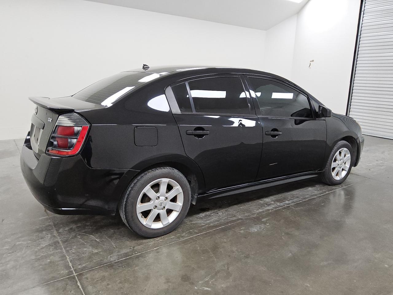 2012 Nissan Sentra 2.0 Черный vin: 3N1AB6AP5CL677326 Damage: Right Rear Door, Dent(S) W/ Paint Dmg, 2 To 3 Inches