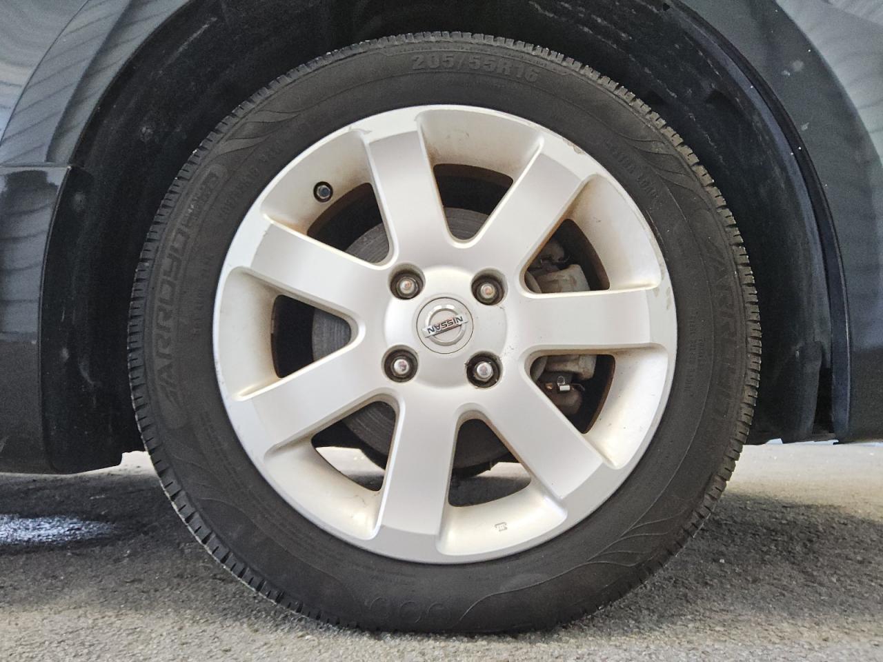 2011 Nissan Sentra 2.0 Black vin: 3N1AB6AP6BL656984 Damage: Right Front Wheel, Curb Rash, > 12 Inches