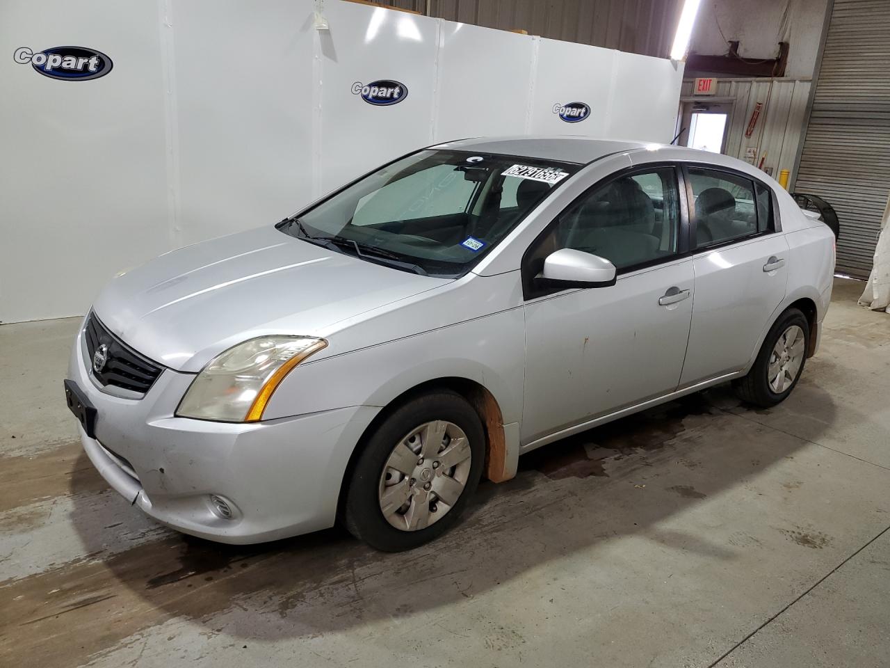 2012 Nissan Sentra 2.0 Silver vin: 3N1AB6AP9CL659735 Damage: Left Front Door, Rust, 3 To 4 Inches
