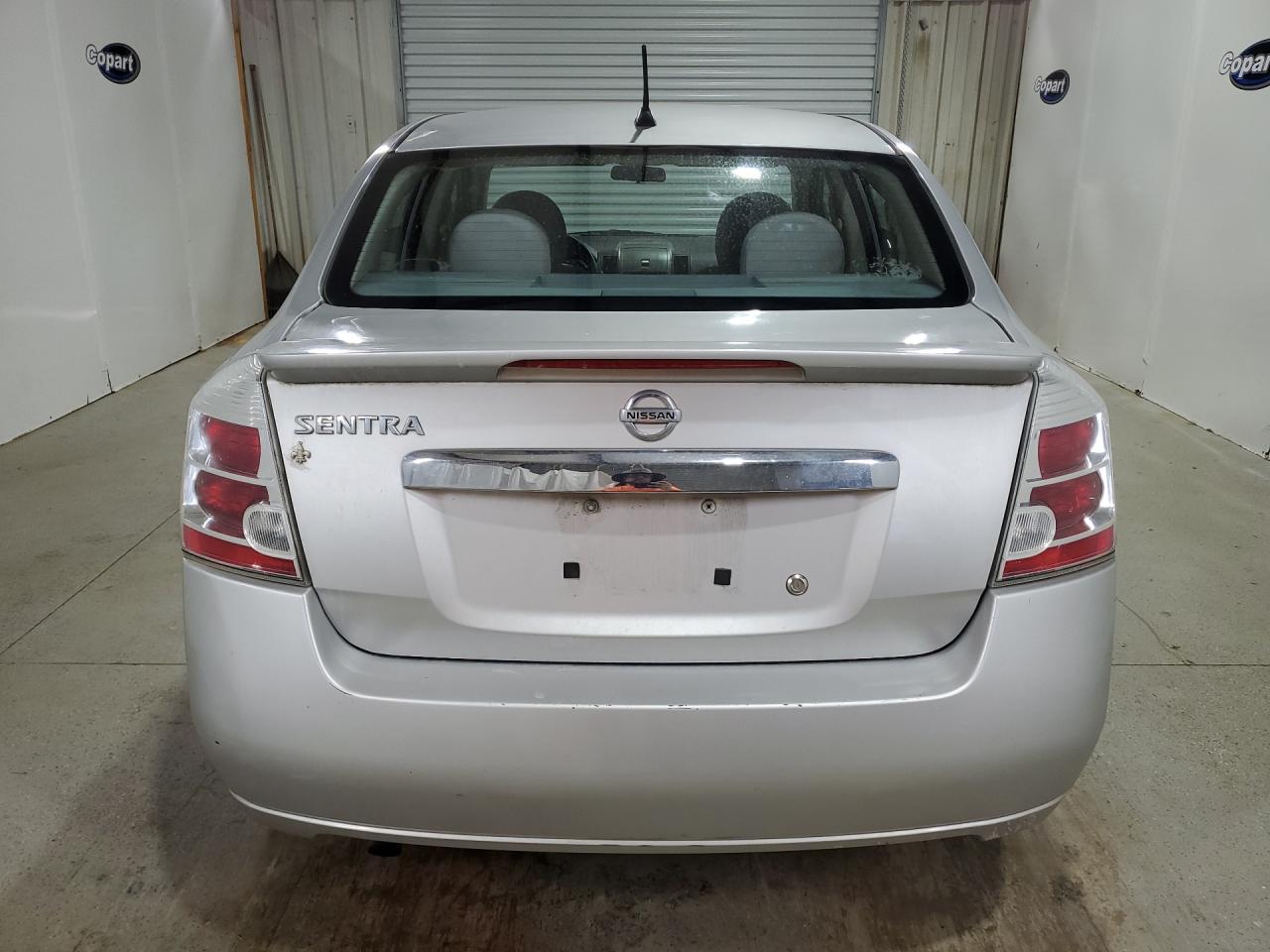 2012 Nissan Sentra 2.0 Silver vin: 3N1AB6AP9CL659735 Damage: Rear Bumper/Cover, Scraped, 4 To 5 Inches