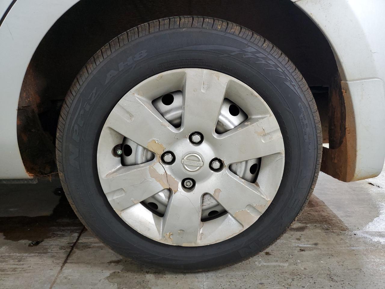 2012 Nissan Sentra 2.0 Silver vin: 3N1AB6AP9CL659735 Damage: Left Rear Wheel Cover, Broken, Replacement Required