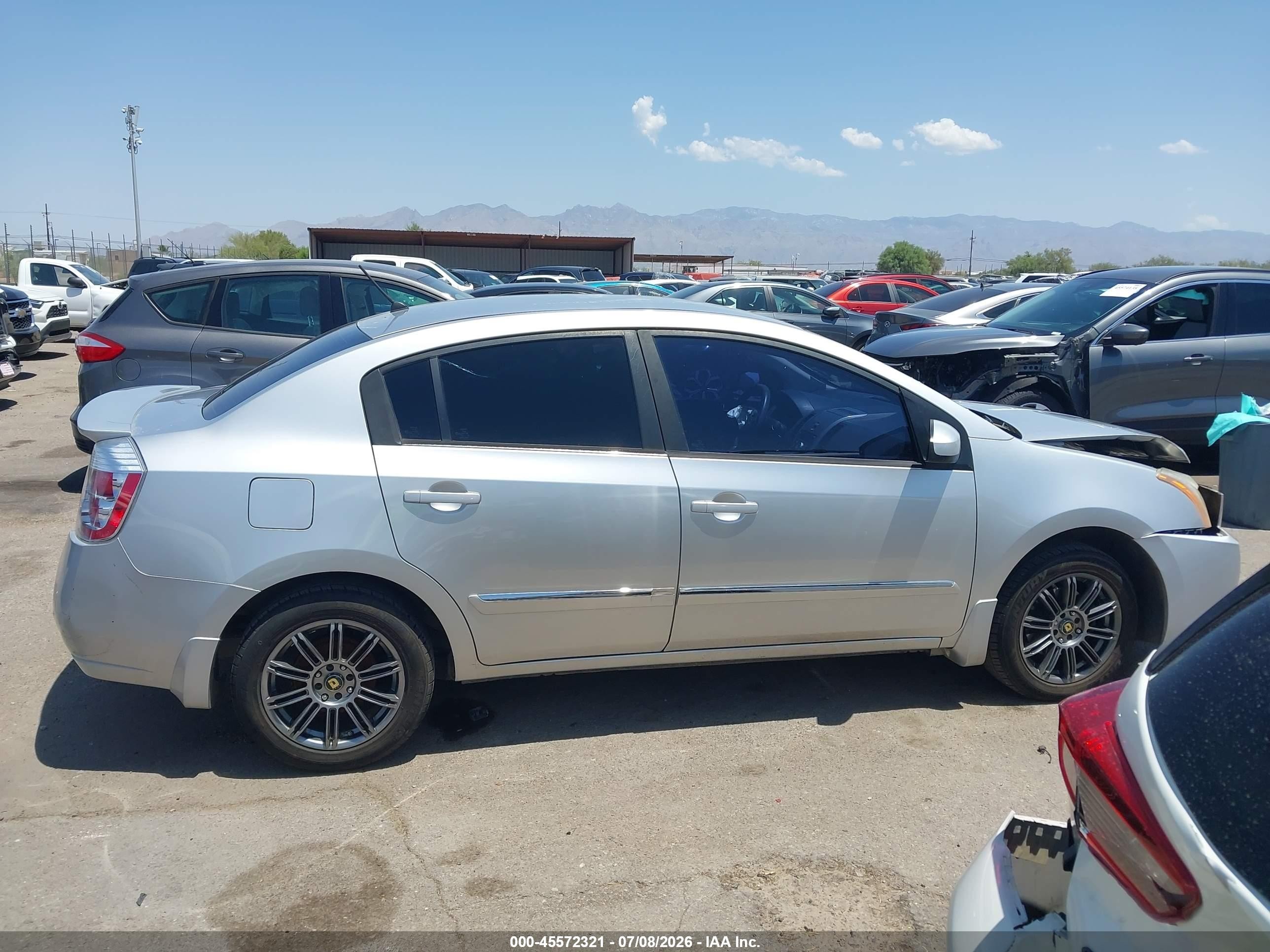 2012 Nissan Sentra 2.0 S Серебряный vin: 3N1AB6AP9CL671092