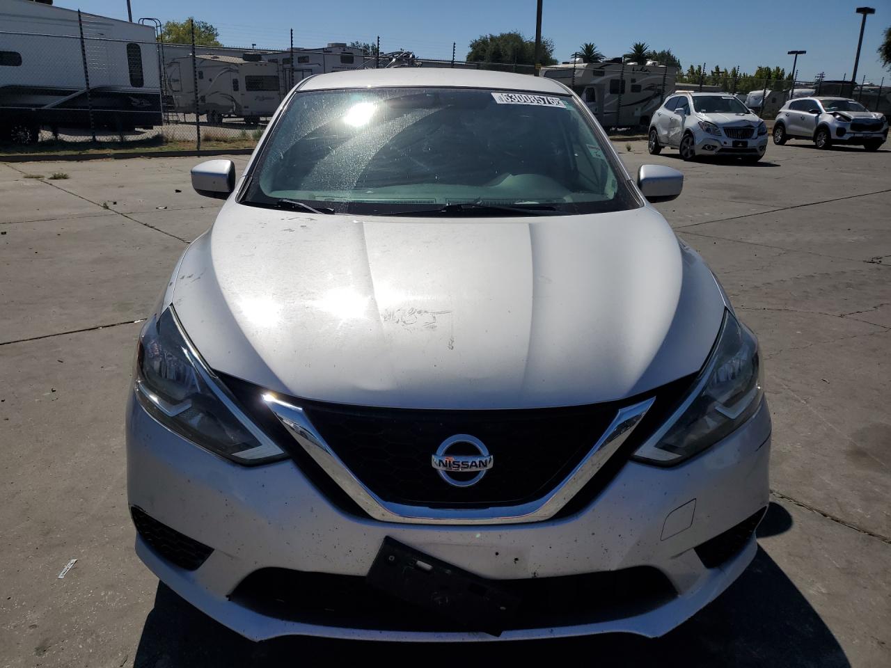 2019 Nissan Sentra Sv Серебряный vin: 3N1AB7AP5KY328321 Damage: Front License Bracket, Misaligned, Repair Required