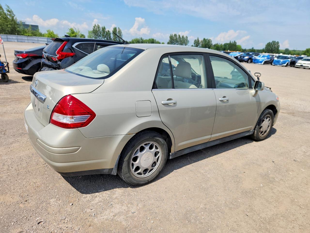 2007 Nissan Versa 1.8 S Beige vin: 3N1BC11E07L406280