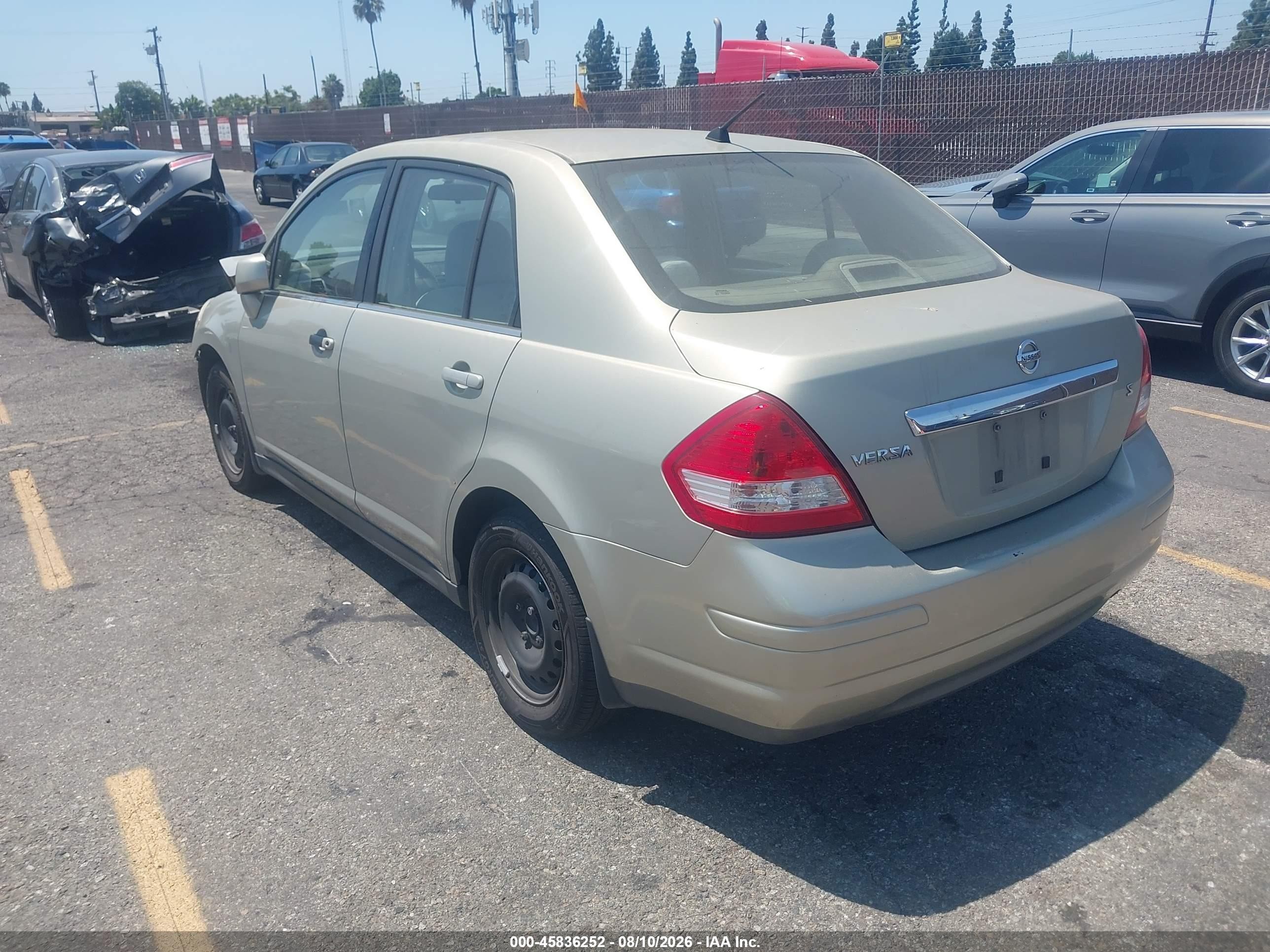 2007 Nissan Versa 1.8s Tan vin: 3N1BC11E07L459061