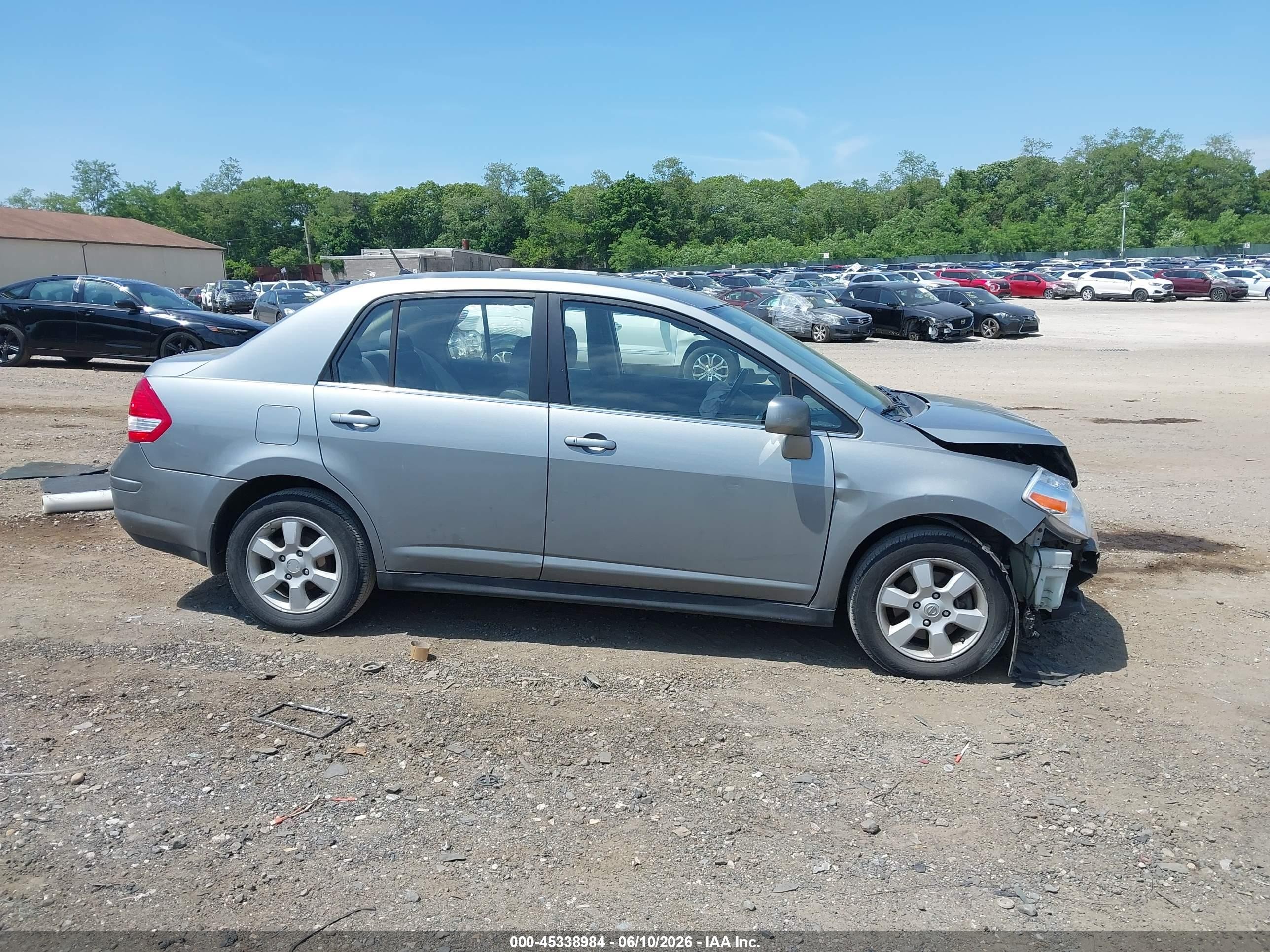 2009 Nissan Versa 1.8sl Серый vin: 3N1BC11E09L362591