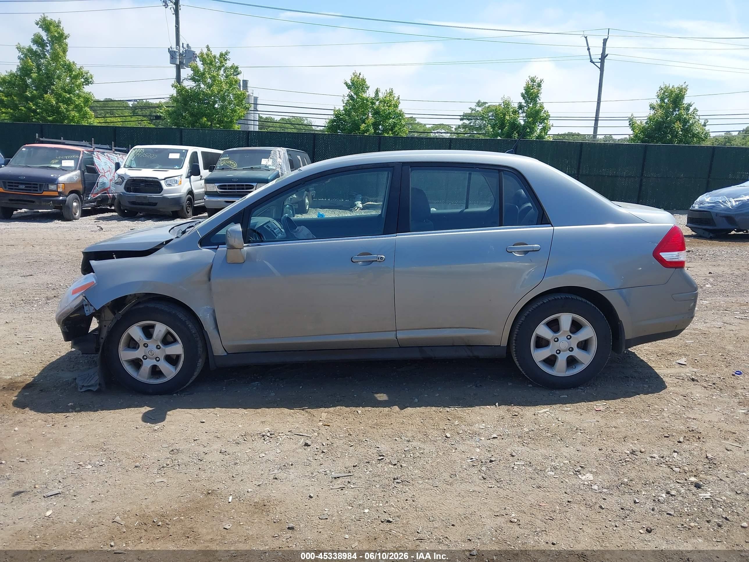 2009 Nissan Versa 1.8sl Серый vin: 3N1BC11E09L362591