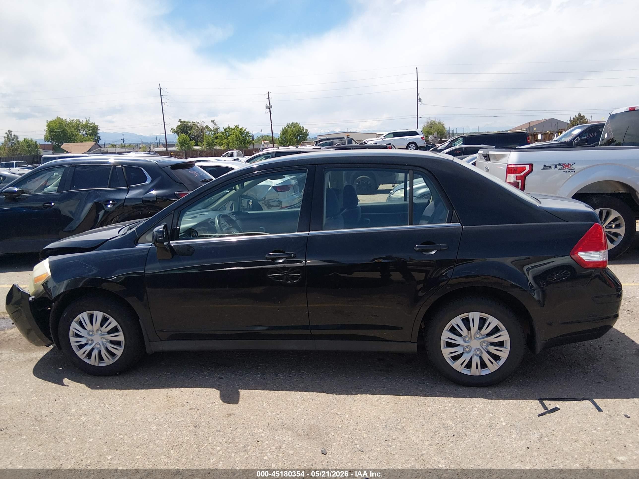 2009 Nissan Versa 1.8s Черный vin: 3N1BC11E29L352466