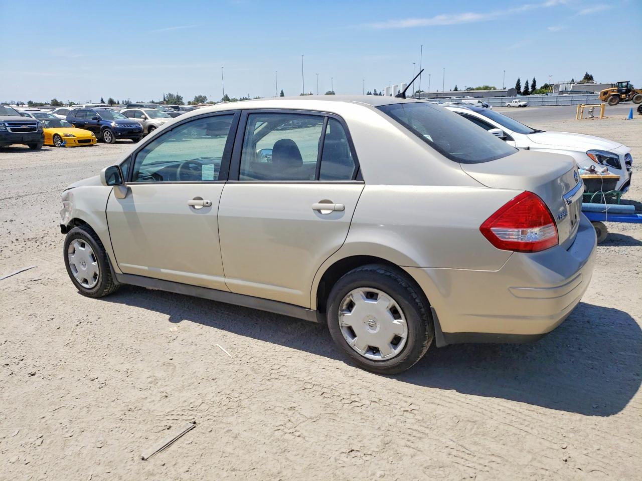 2009 Nissan Versa 1.8 S Cream vin: 3N1BC11E39L424534