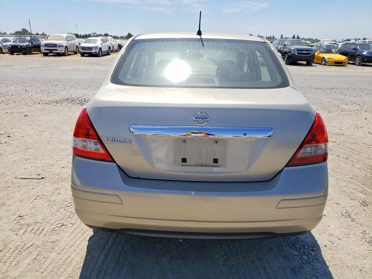 2009 Nissan Versa 1.8 S Cream vin: 3N1BC11E39L424534