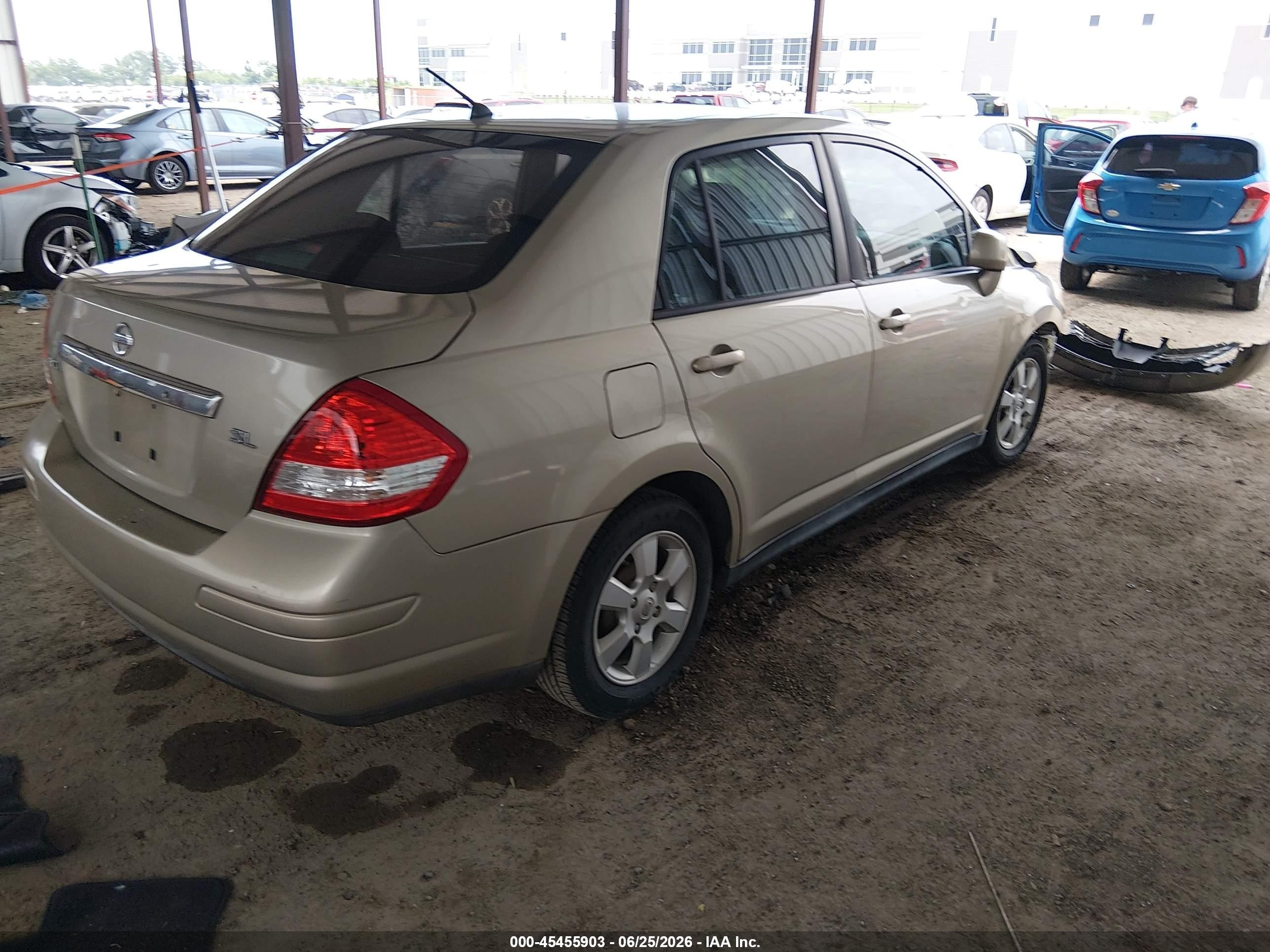 2009 Nissan Versa 1.8sl Gold vin: 3N1BC11E39L476231