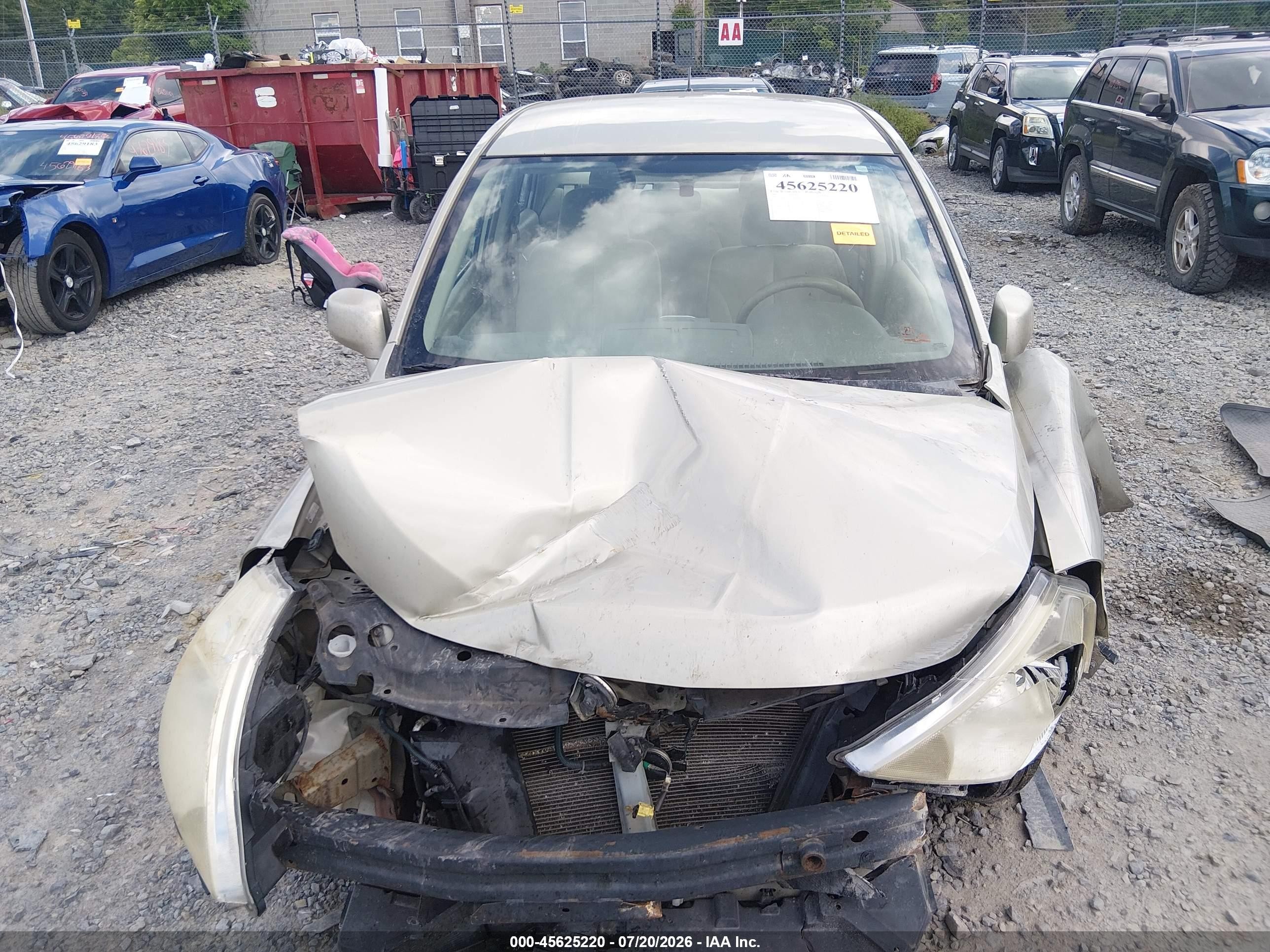 2007 Nissan Versa 1.8s Champagne vin: 3N1BC11E47L443283