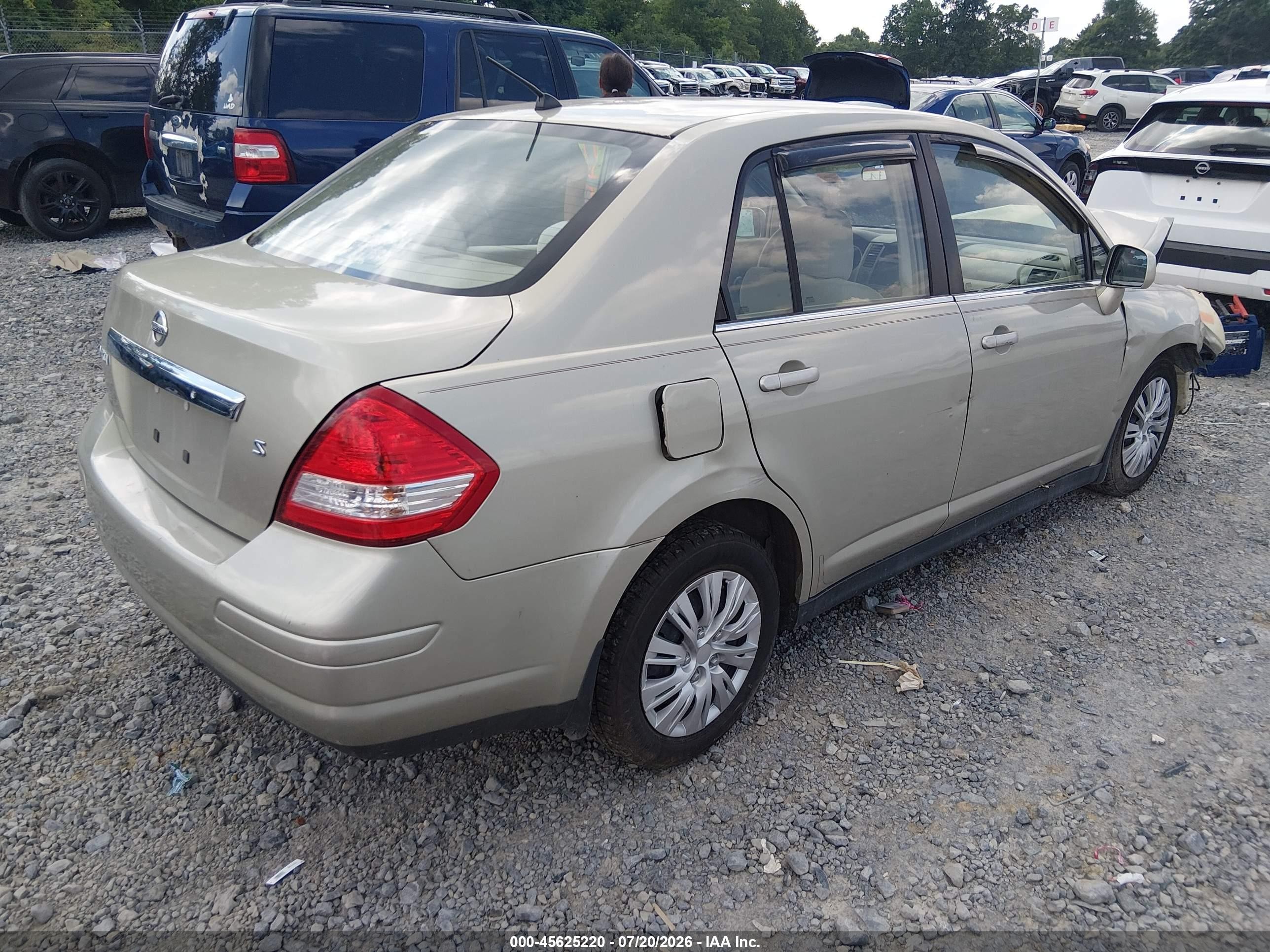 2007 Nissan Versa 1.8s Champagne vin: 3N1BC11E47L443283