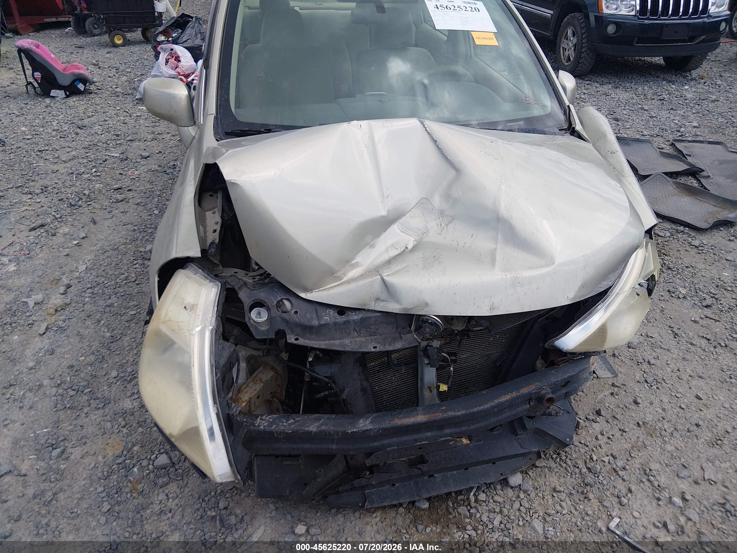 2007 Nissan Versa 1.8s Champagne vin: 3N1BC11E47L443283