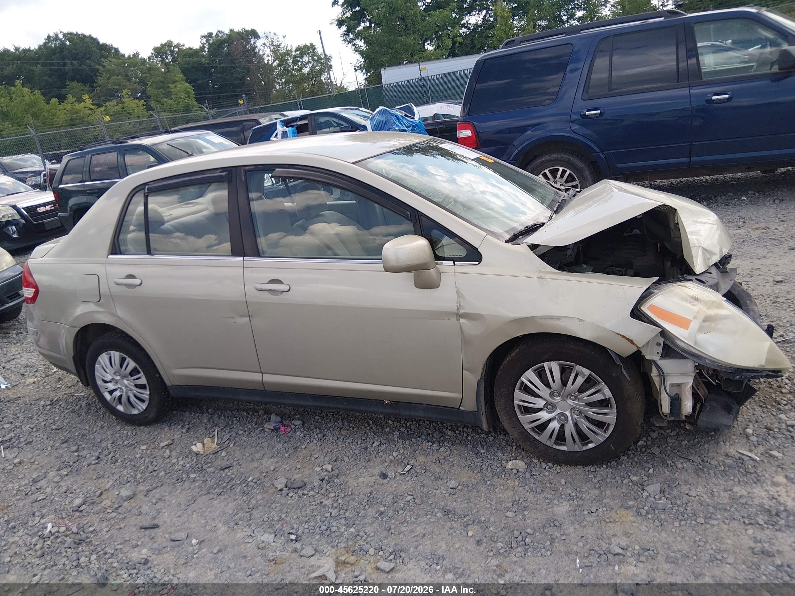 2007 Nissan Versa 1.8s Champagne vin: 3N1BC11E47L443283