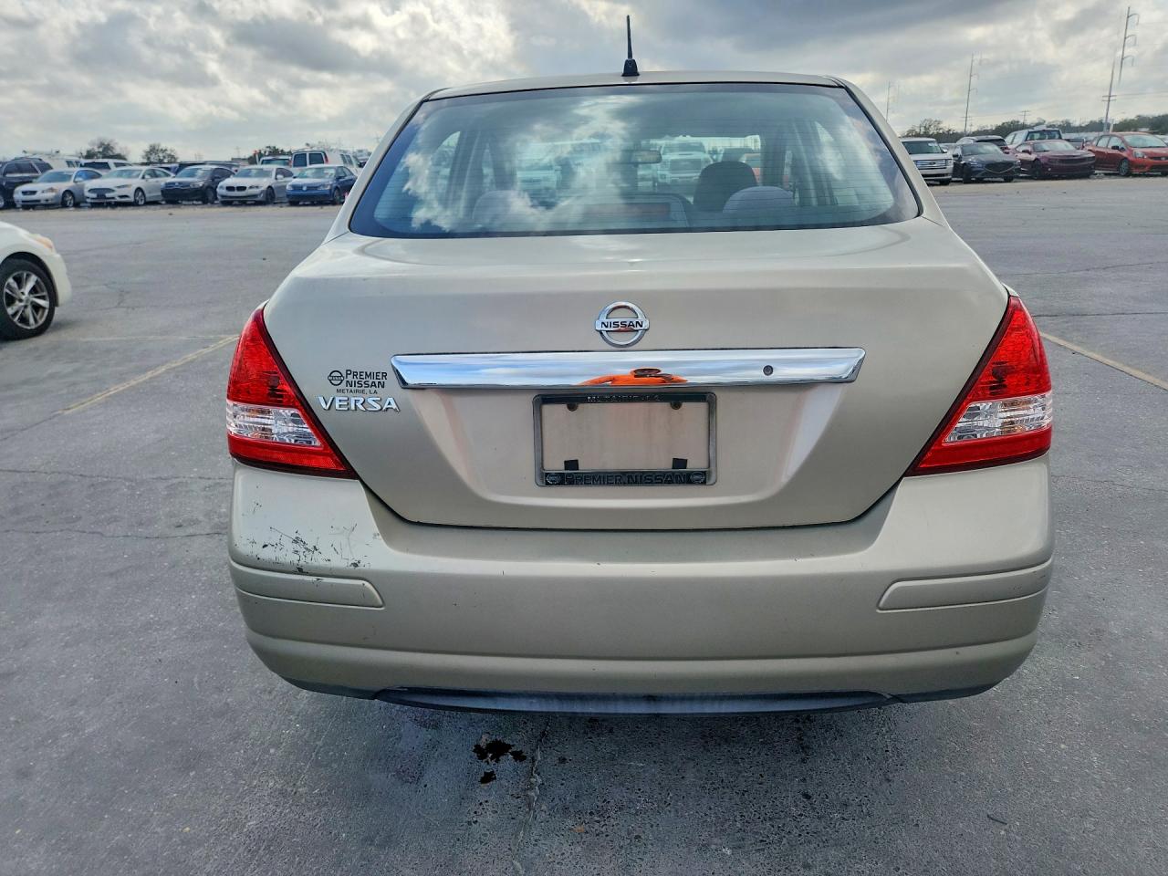 2009 Nissan Versa S Gold vin: 3N1BC11E49L470888