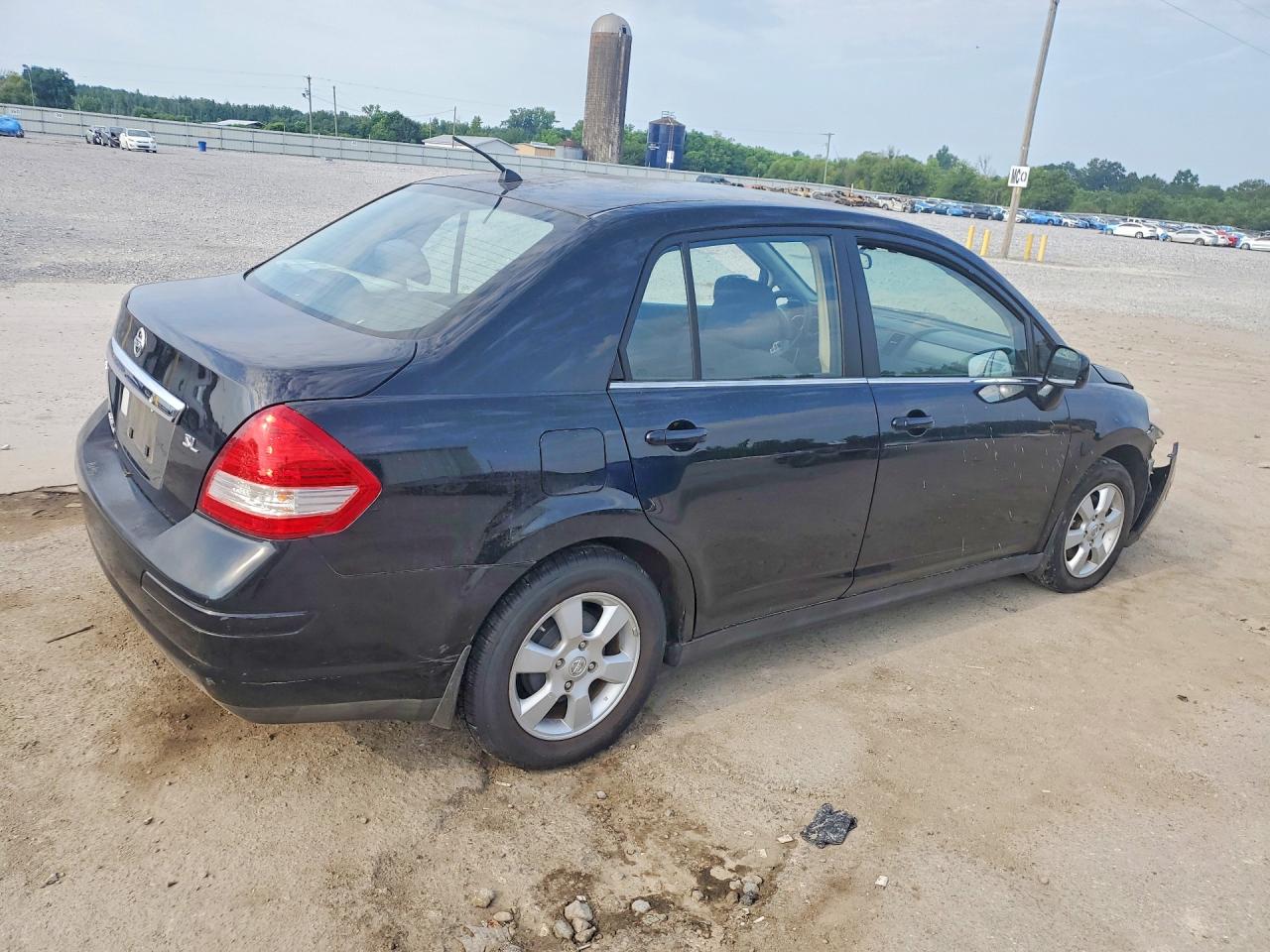 2007 Nissan Versa 1.8 S Черный vin: 3N1BC11E57L411670